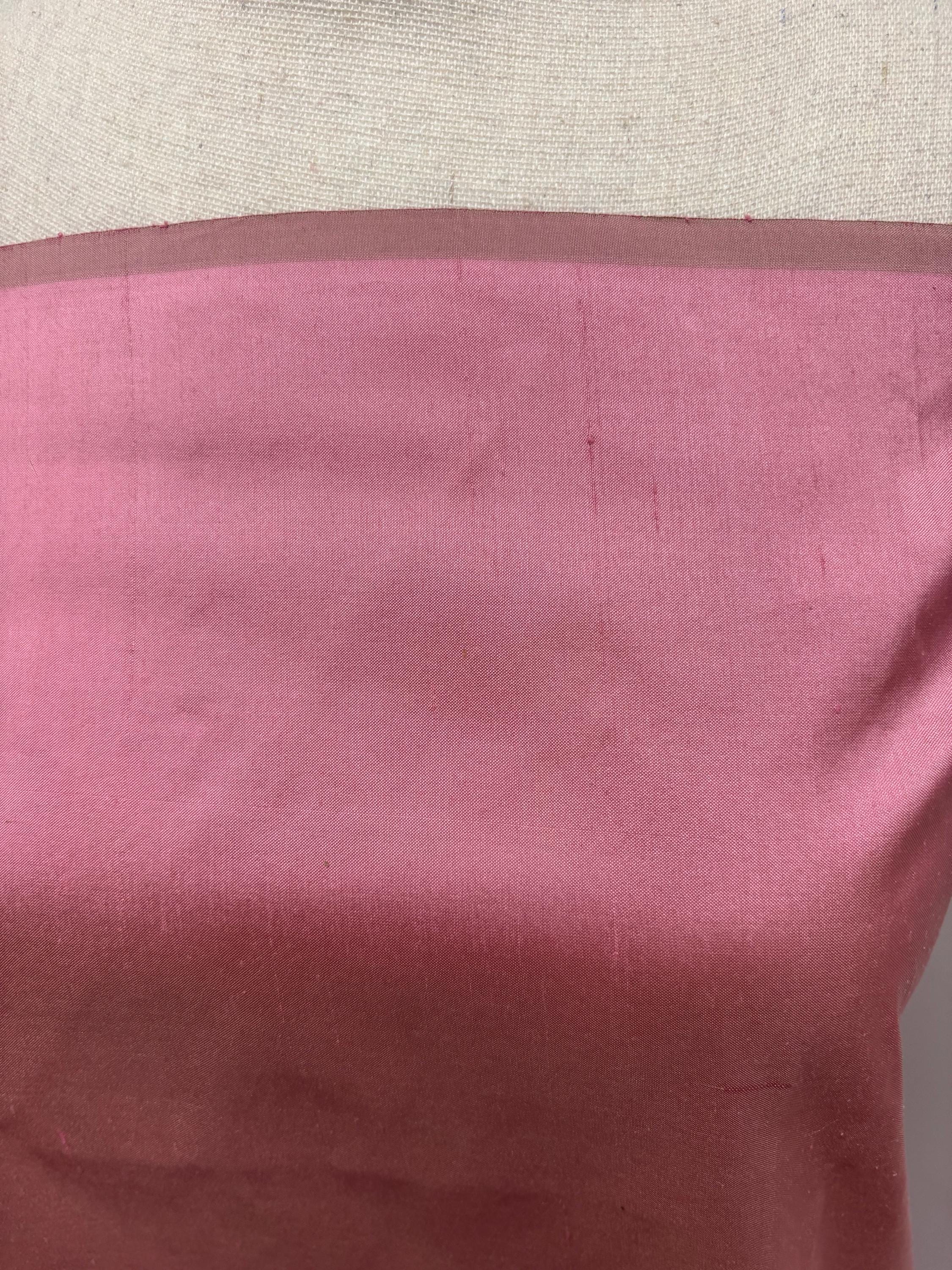 100% silk Dupioni Taffeta width 54" color is Rose sage. Machine made, fabric has slubs. Item # 9. Fabric has greenish tone.free sample.