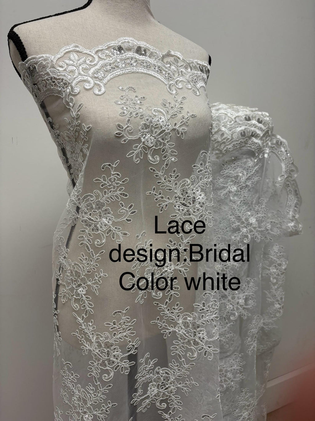 Bridal Lace White color, sequins, embroidery double scalloped edges. Width 49/50". tela de encaje de color blanco