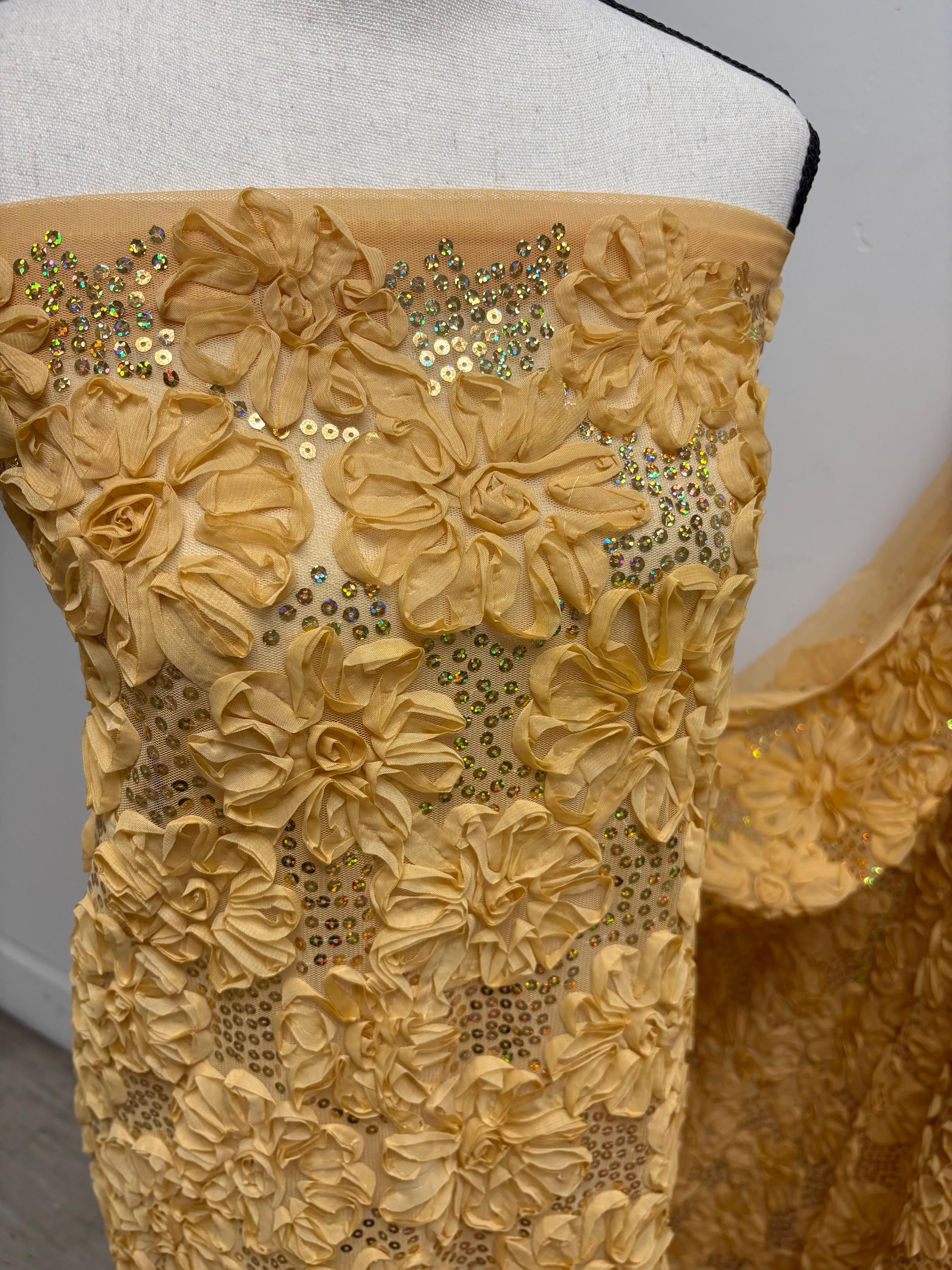 Chiffon ribbon mesh fabric color gold with sequence. sells by yard.