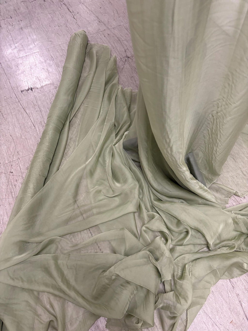 A 3 yards chiffon fabric color Lt.sage sell by 3 yards increment continuous, width 58/60" polyester, soft sheer see through fabric.