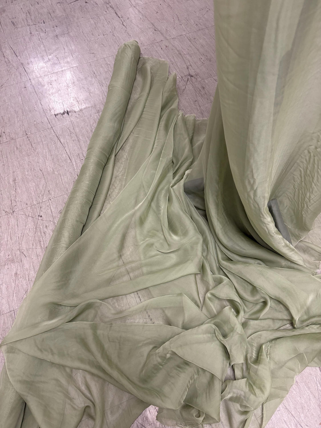 A 3 yards chiffon fabric color Lt.sage sell by 3 yards increment continuous, width 58/60" polyester, soft sheer see through fabric.