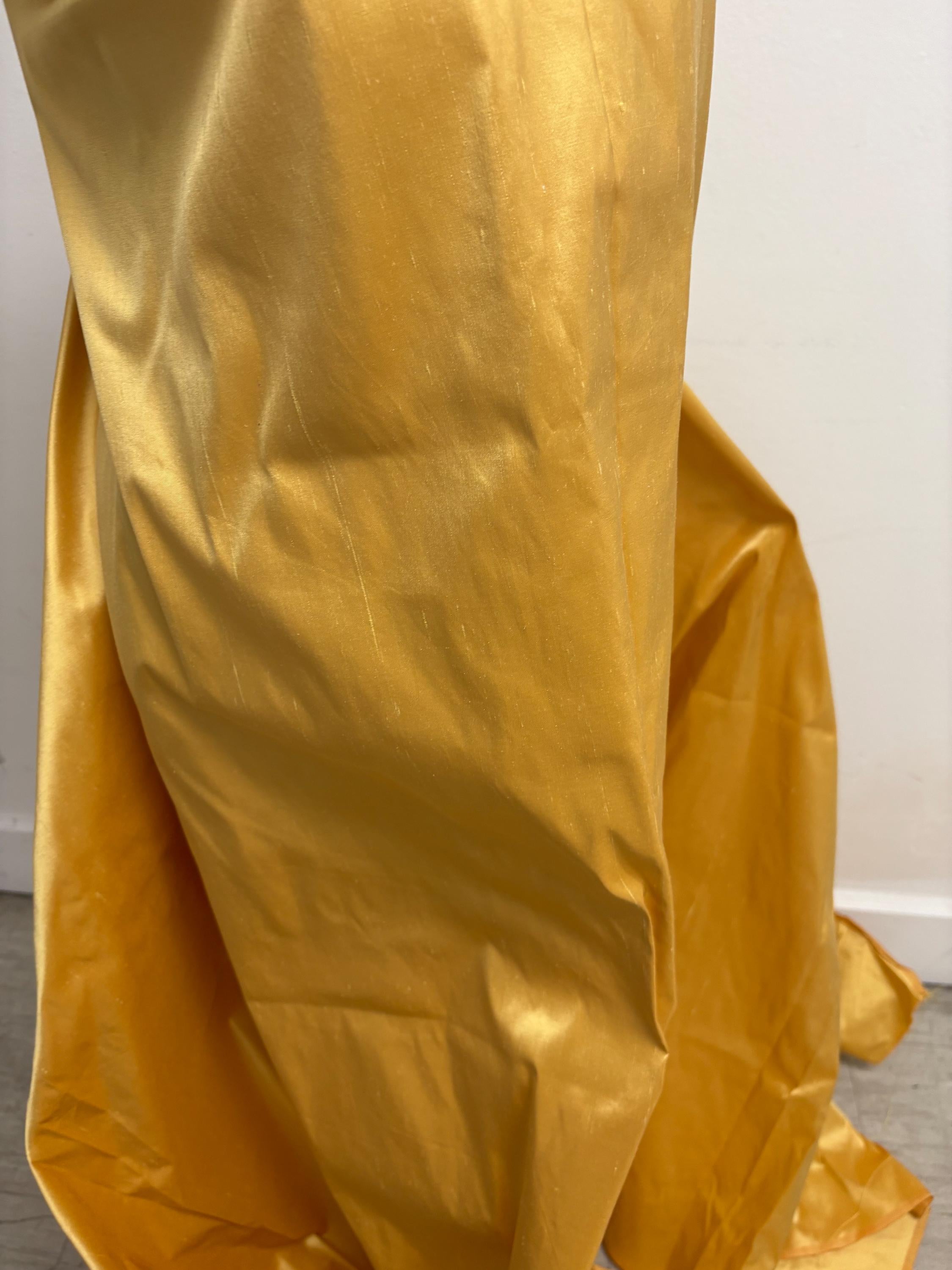 100% silk Dupioni Taffeta width 54" color is Gold 2209. Machine made, fabric has slubs. free sample. shop with confidence.