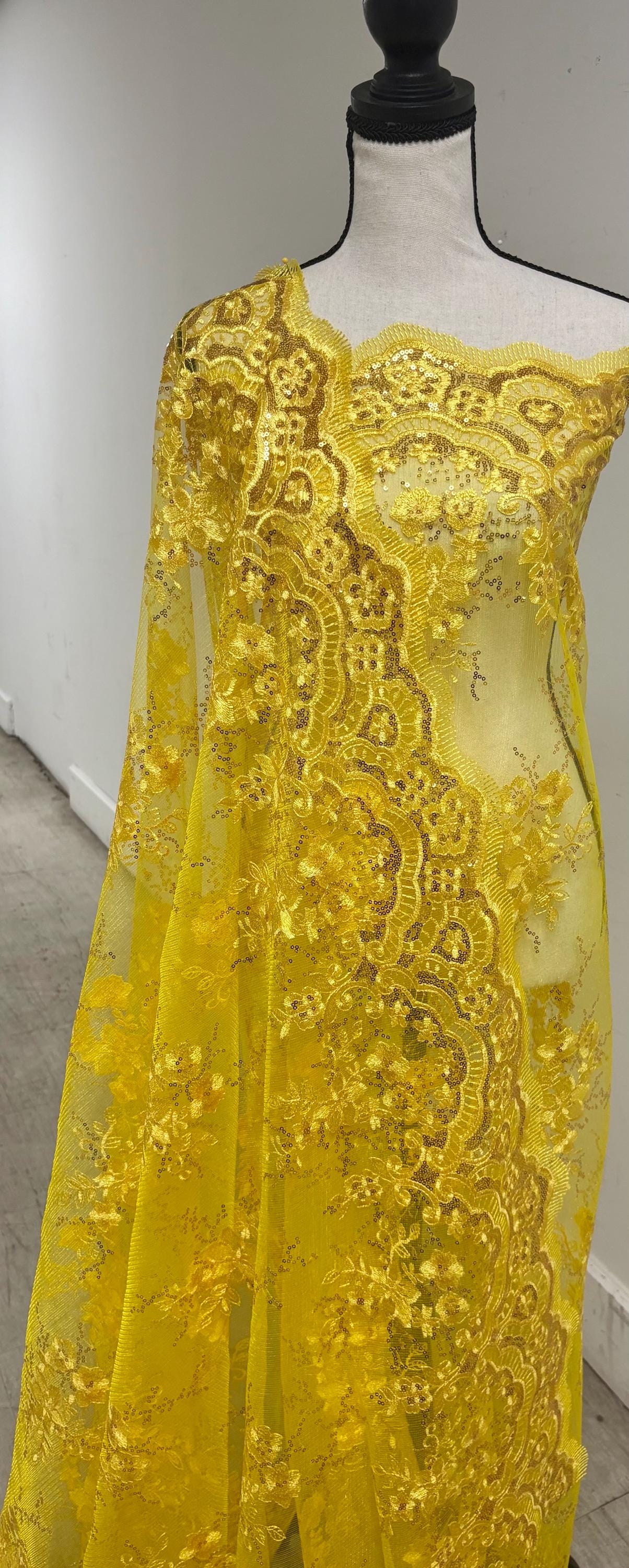 A 2 yards cut Lace color Yellow. Double scalloped sequence embroidered width 49/50 inches. condition. sell by 2 yards cut continues. KMS2