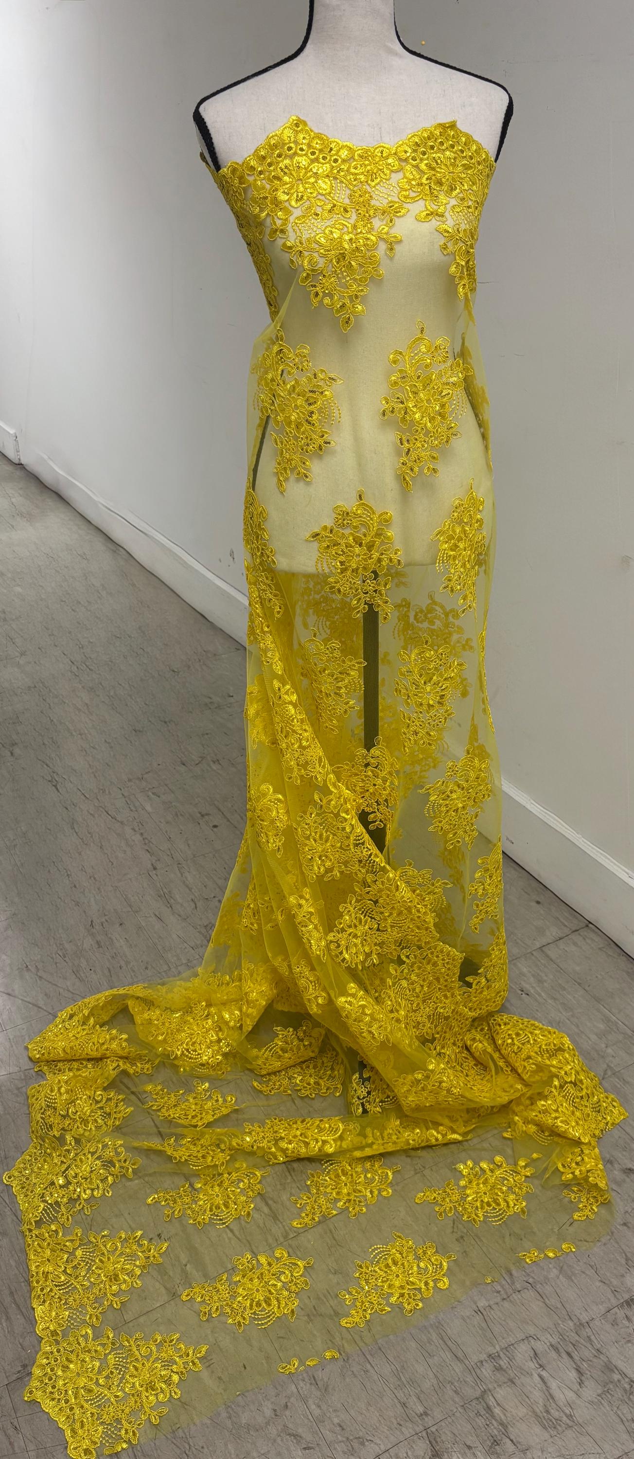 A 2 yards cut Lace color Yellow. Double scalloped sequence embroidered width 49/50 inches. condition. sell by 2 yards cut continues. 1098Nas