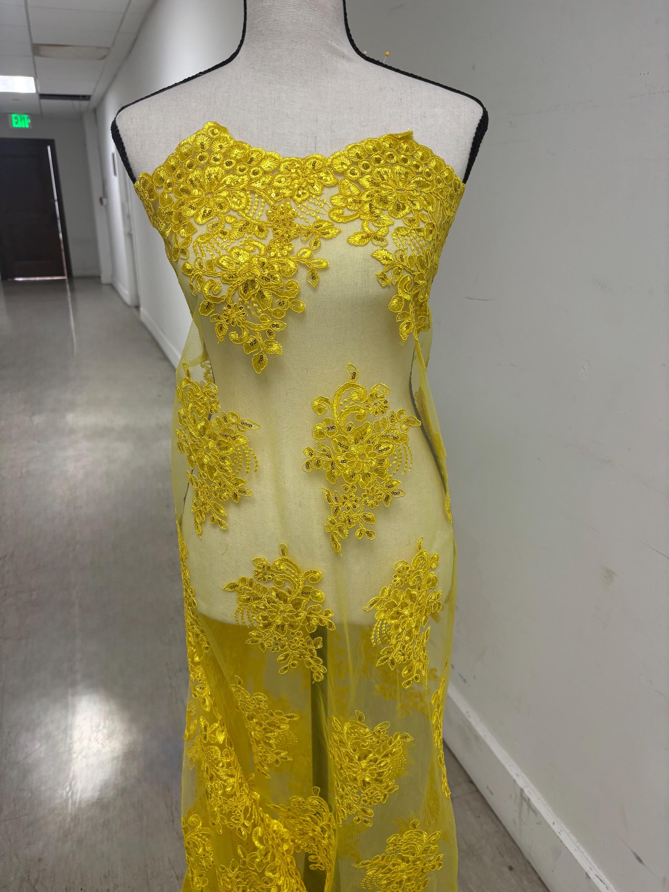 A 2 yards cut Lace color Yellow. Double scalloped sequence embroidered width 49/50 inches. condition. sell by 2 yards cut continues. 1098Nas