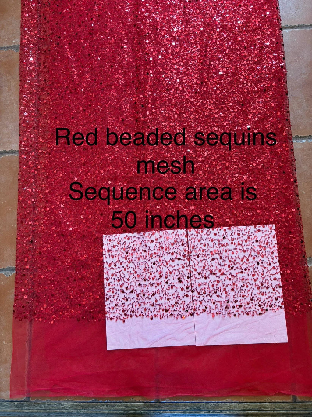 Red Beaded sequence mesh, width of sequence area is 50", plain mesh salvages on both end. item D8-NAS