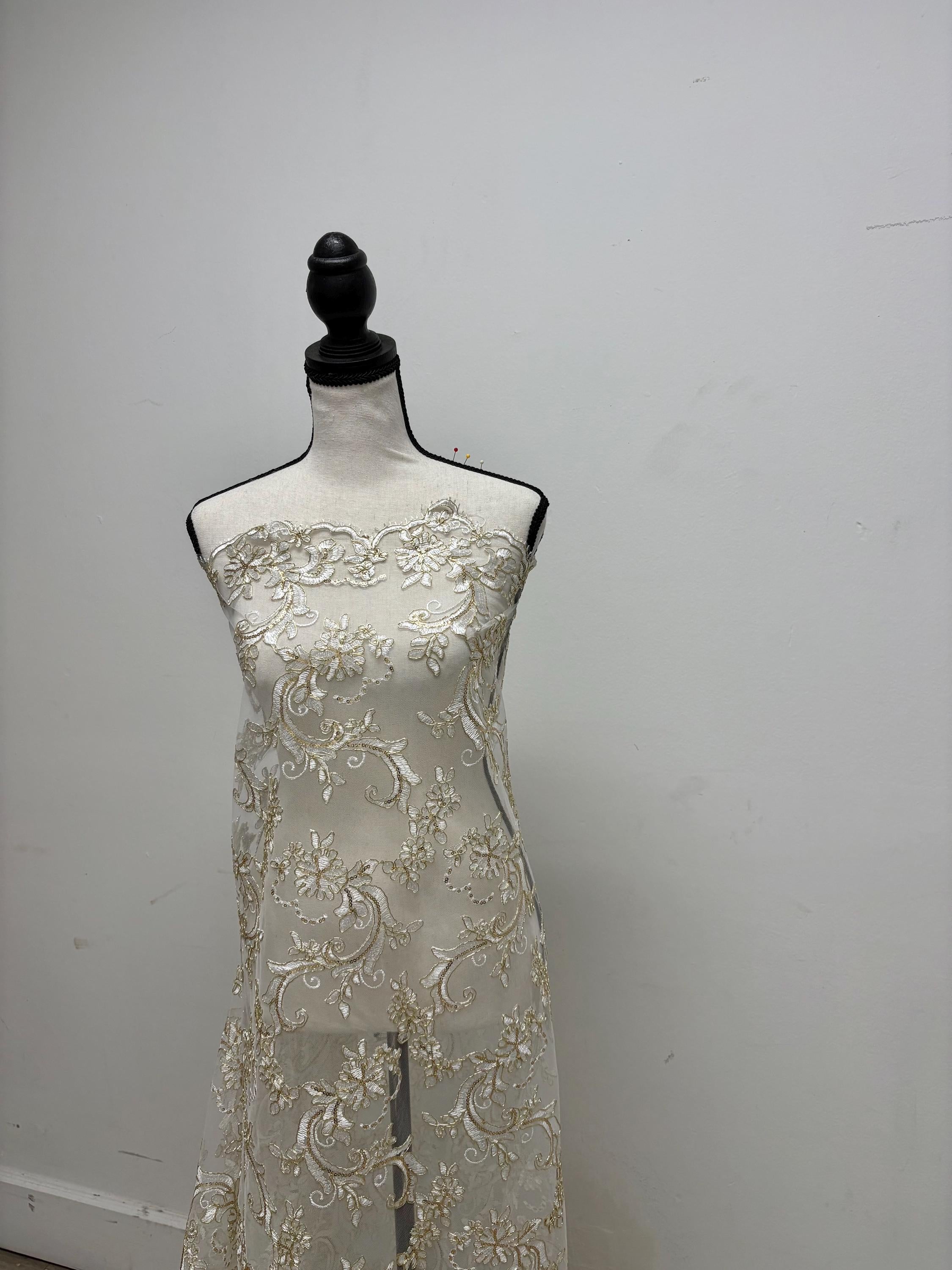 Ivory Gold lace fabric design yx846, sequins, embroidery double scalloped edges. Width 49/50".