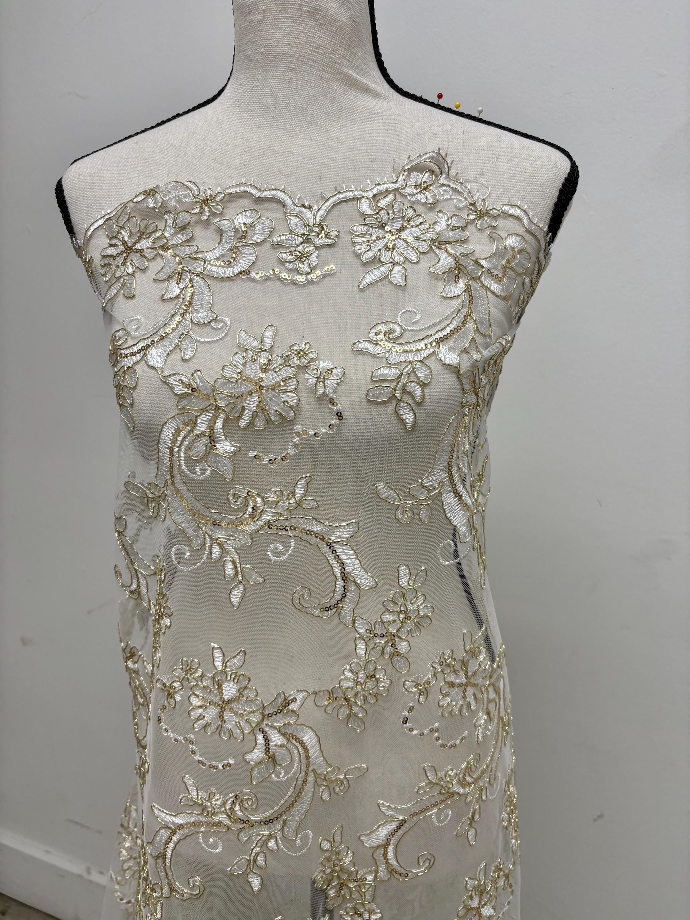 Ivory Gold lace fabric design yx846, sequins, embroidery double scalloped edges. Width 49/50".