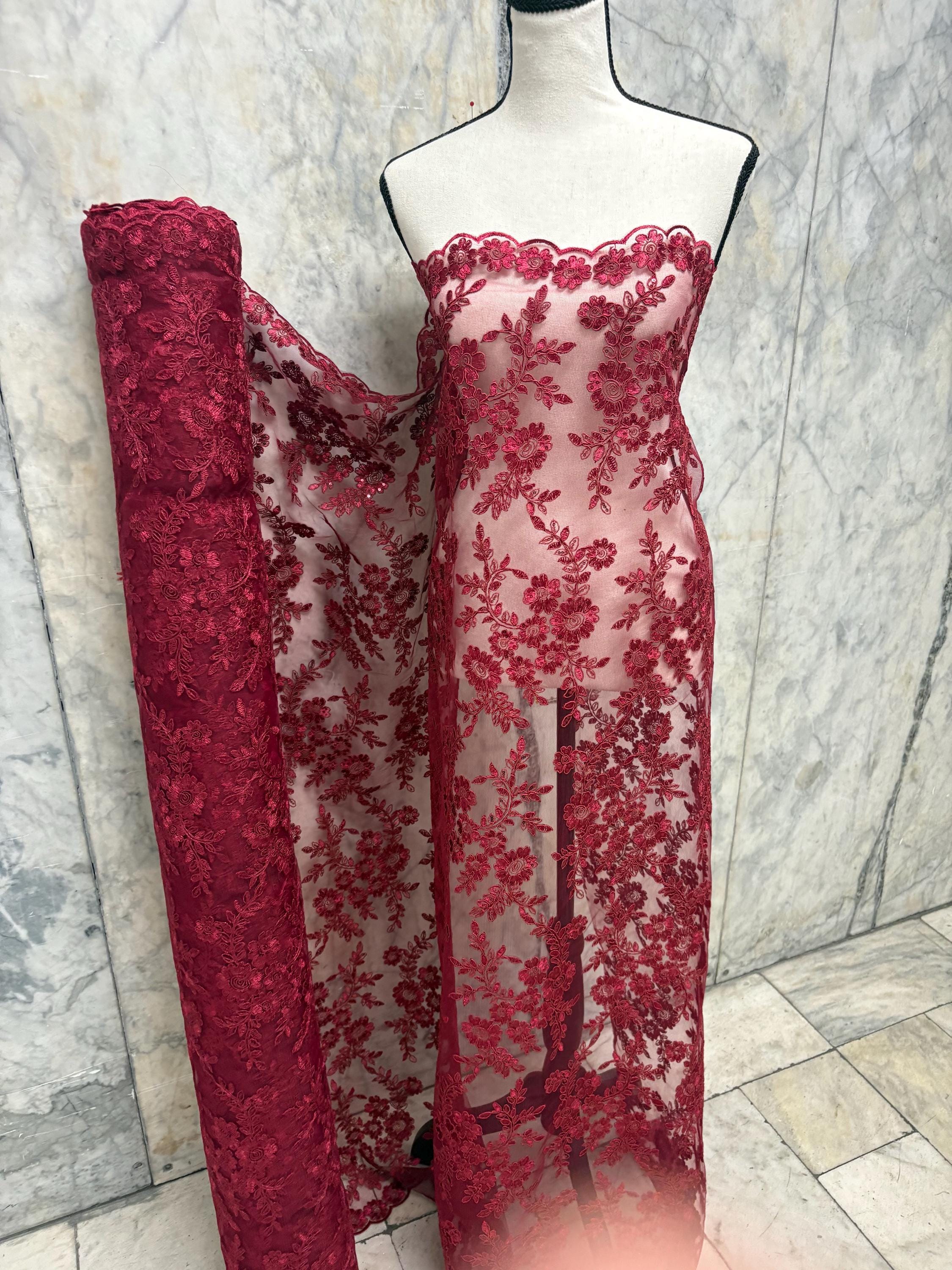 Burgundy Lace fabric design bloom 6 width 49". Double scalloped embroidery sequence.