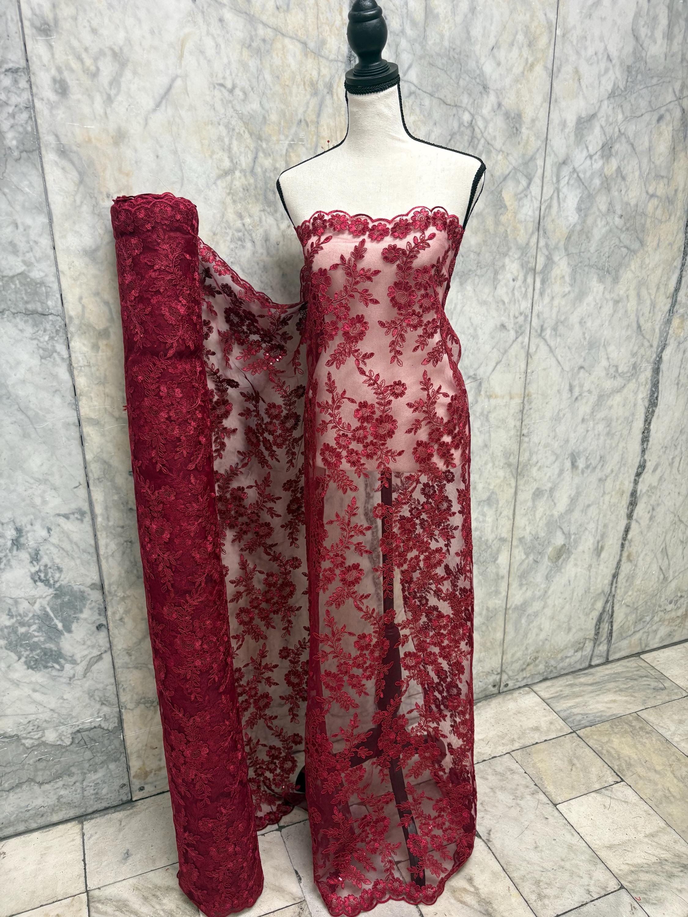 Burgundy Lace fabric design bloom 6 width 49". Double scalloped embroidery sequence.