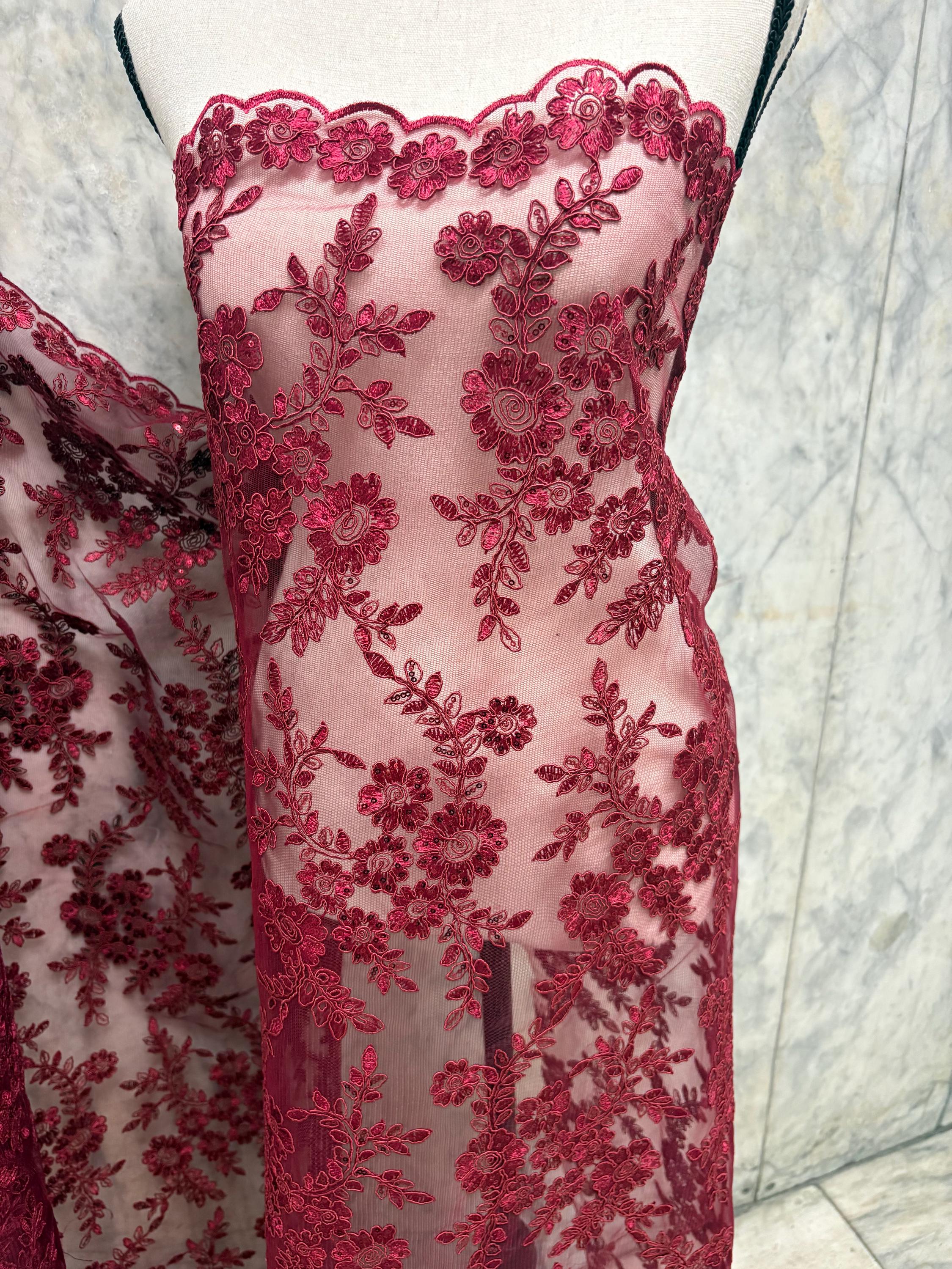 Burgundy Lace fabric design bloom 6 width 49". Double scalloped embroidery sequence.