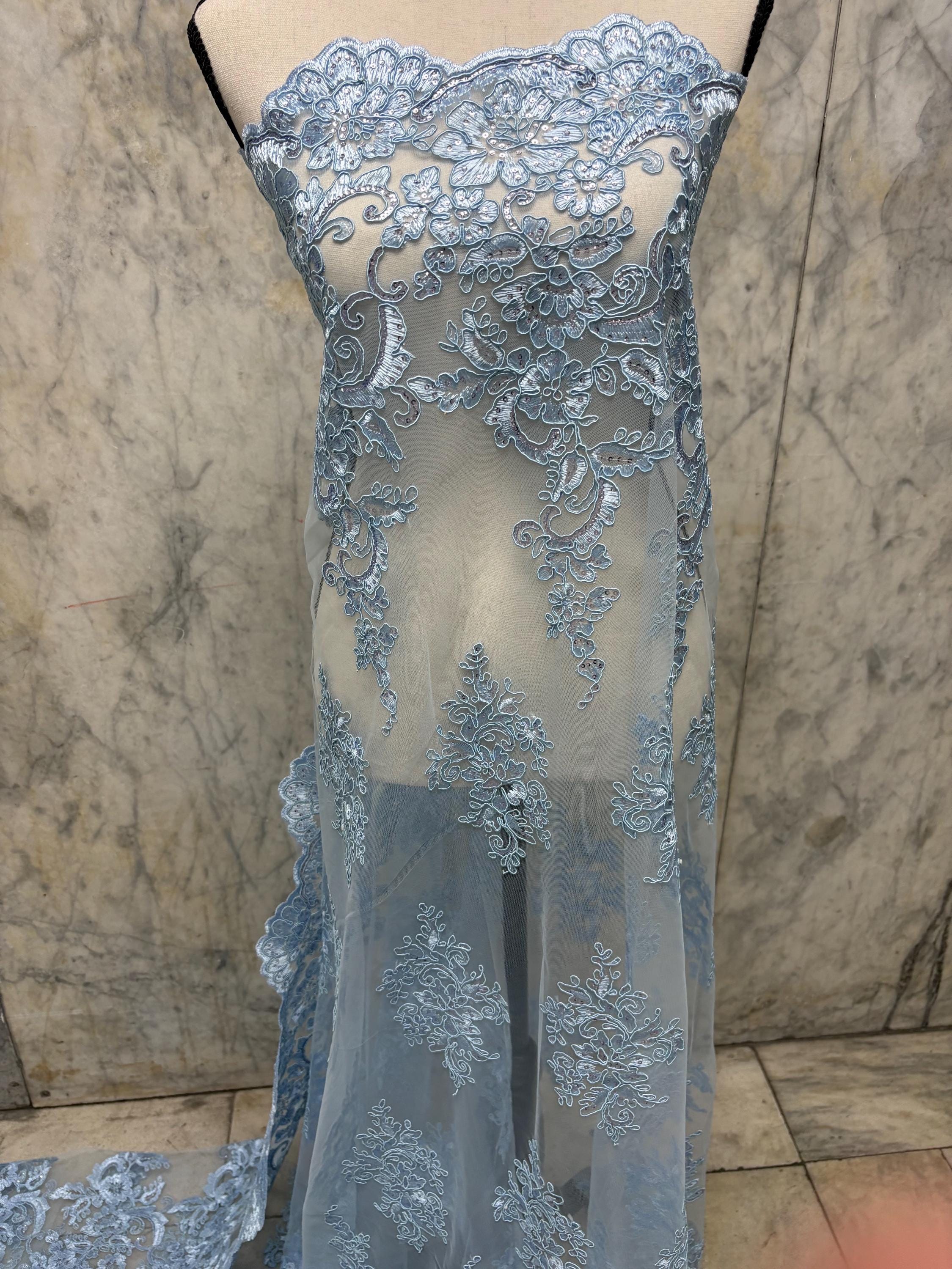 Blue Lace Fabric Design US50. Double scalloped sequence embroidered width 49/50 inches. condition New. sell by yard.