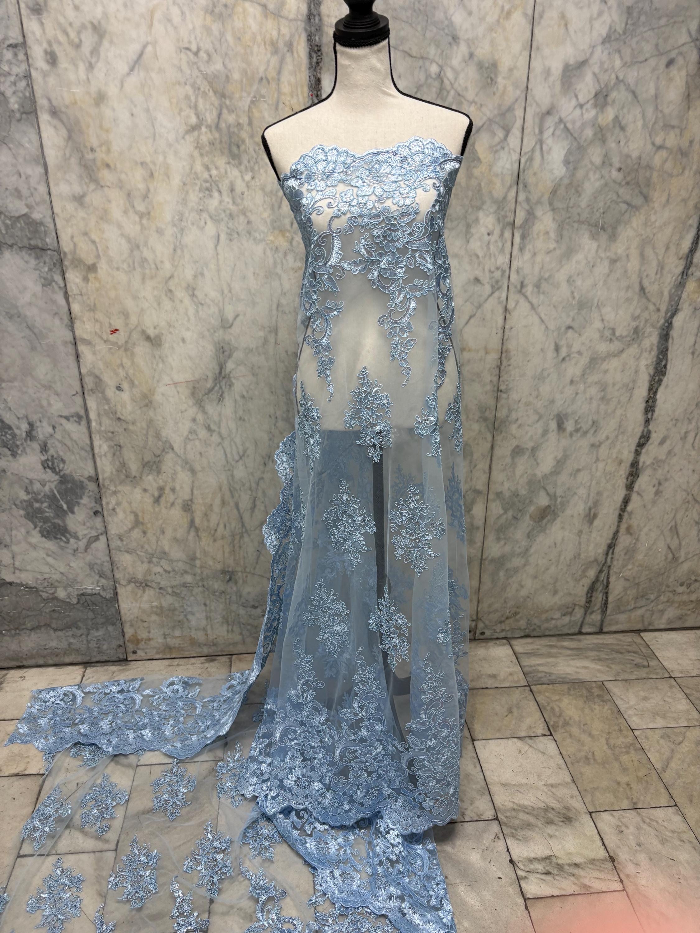 Blue Lace Fabric Design US50. Double scalloped sequence embroidered width 49/50 inches. condition New. sell by yard.