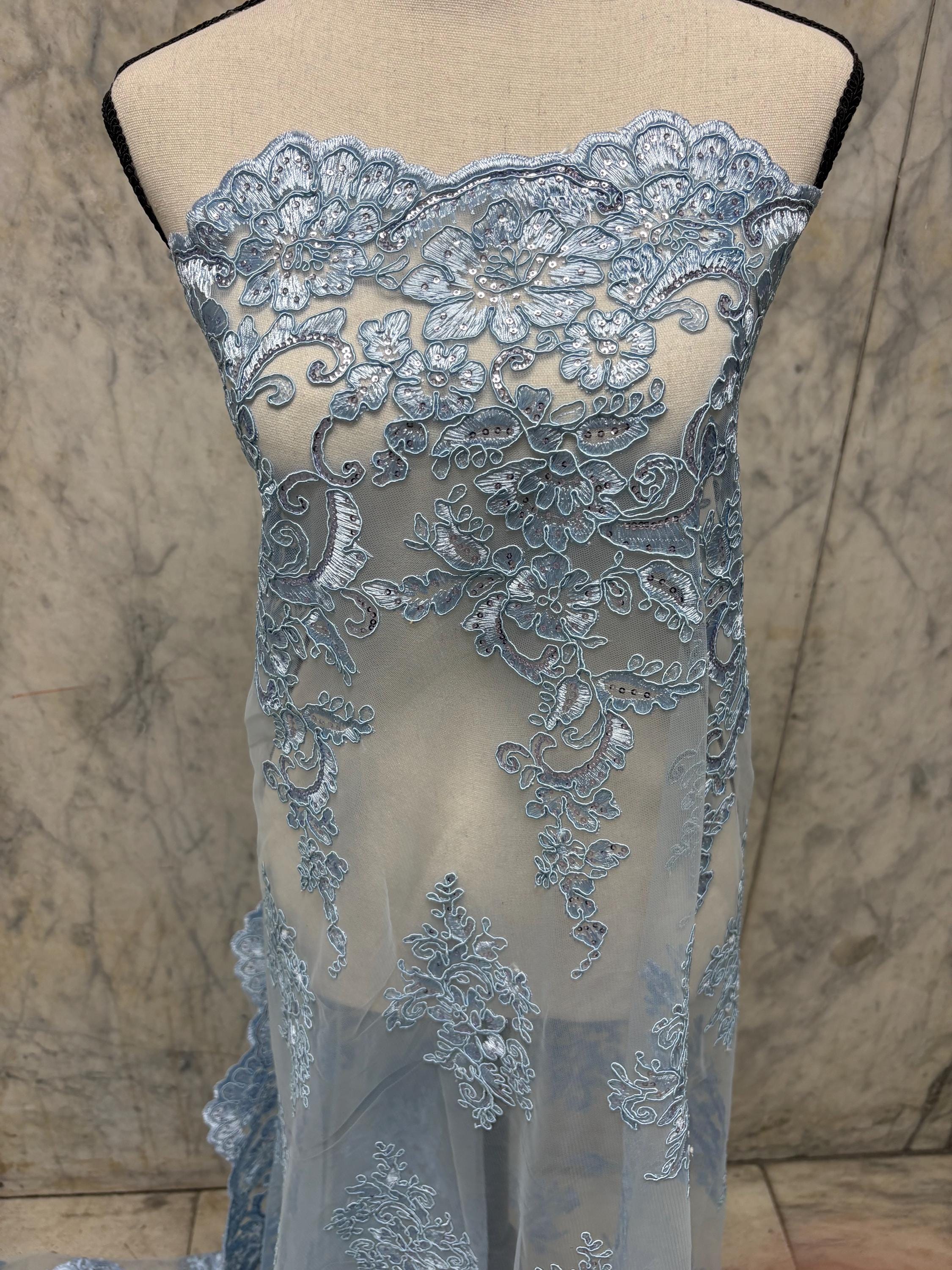 Blue Lace Fabric Design US50. Double scalloped sequence embroidered width 49/50 inches. condition New. sell by yard.