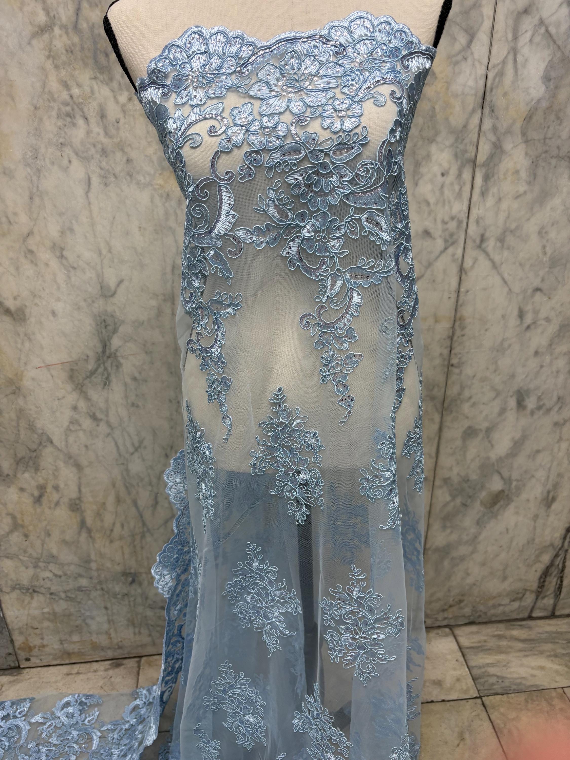 Blue Lace Fabric Design US50. Double scalloped sequence embroidered width 49/50 inches. condition New. sell by yard.