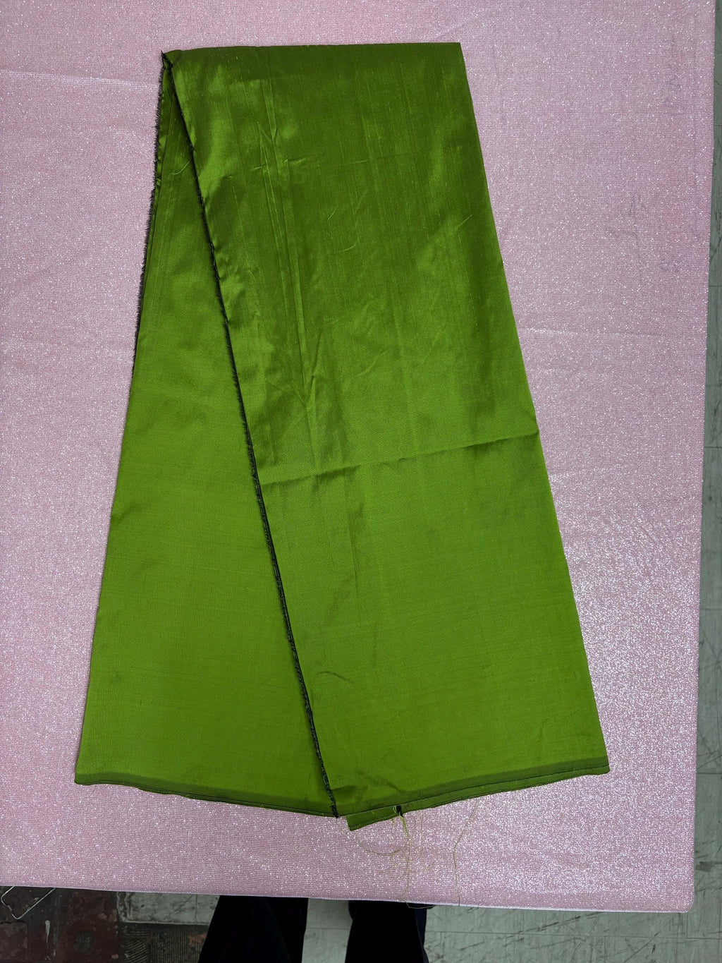 100% silk Dupioni Taffeta width 54" color is two tone Olive with black tone. Machine made, fabric has slubs. Item # 3. free sample.