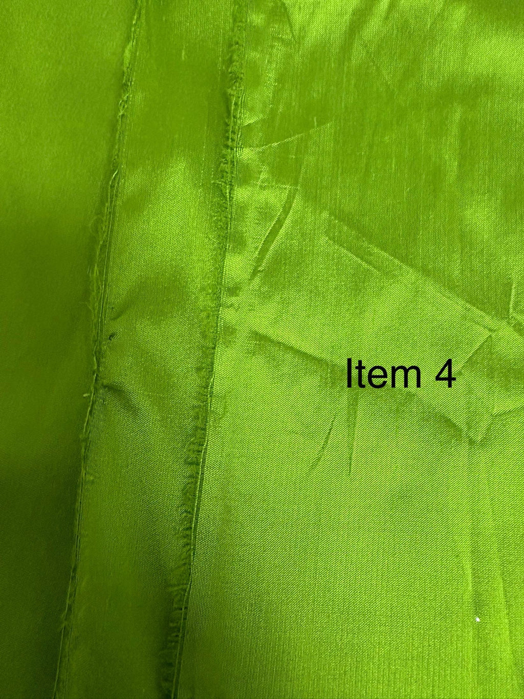 100% silk Dupioni Taffeta width 54" color is Lt.Olive. Machine made, fabric has slubs. Item # 4. free sample.