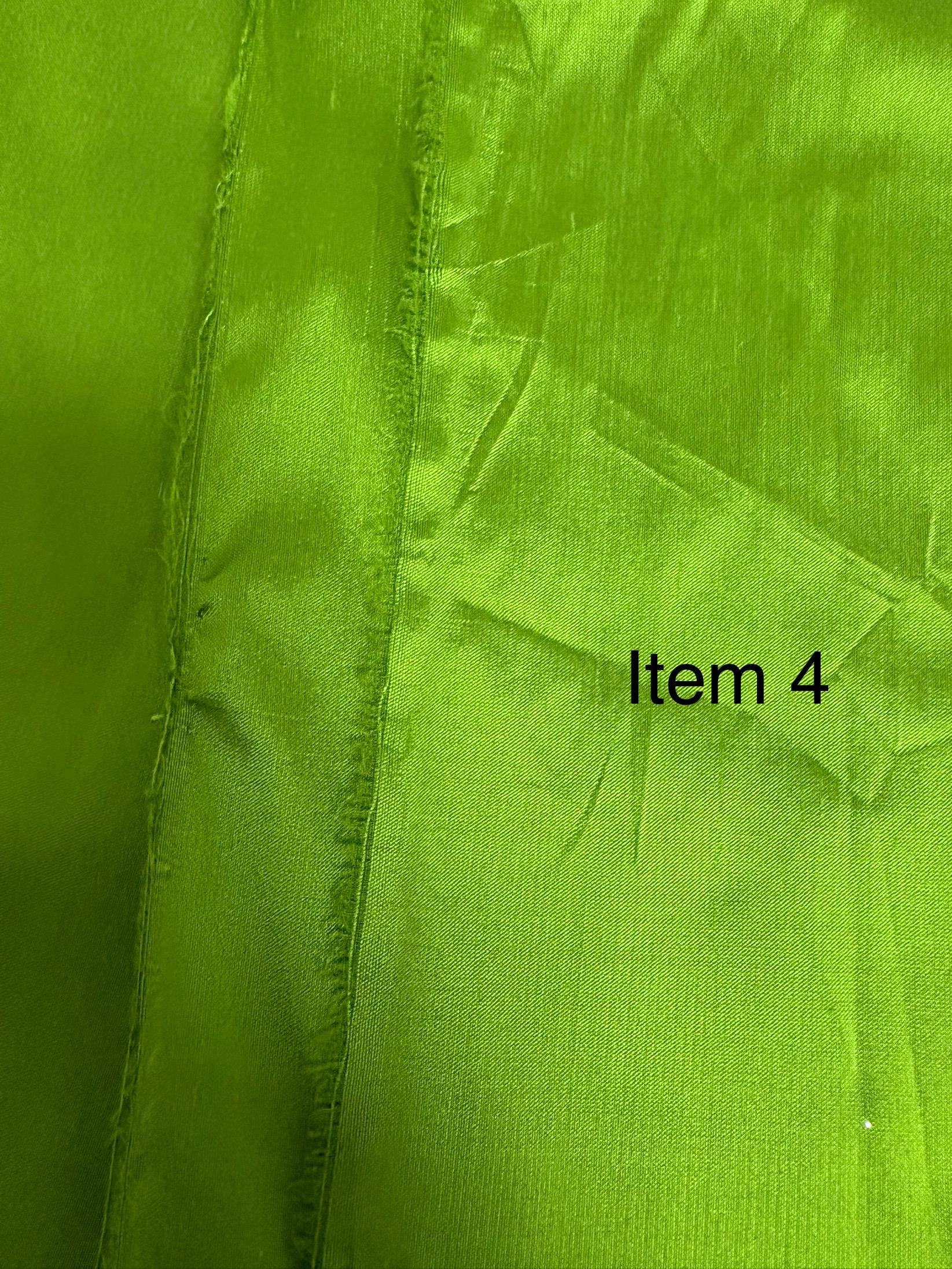 100% silk Dupioni Taffeta width 54" color is Lt.Olive. Machine made, fabric has slubs. Item # 4. free sample.