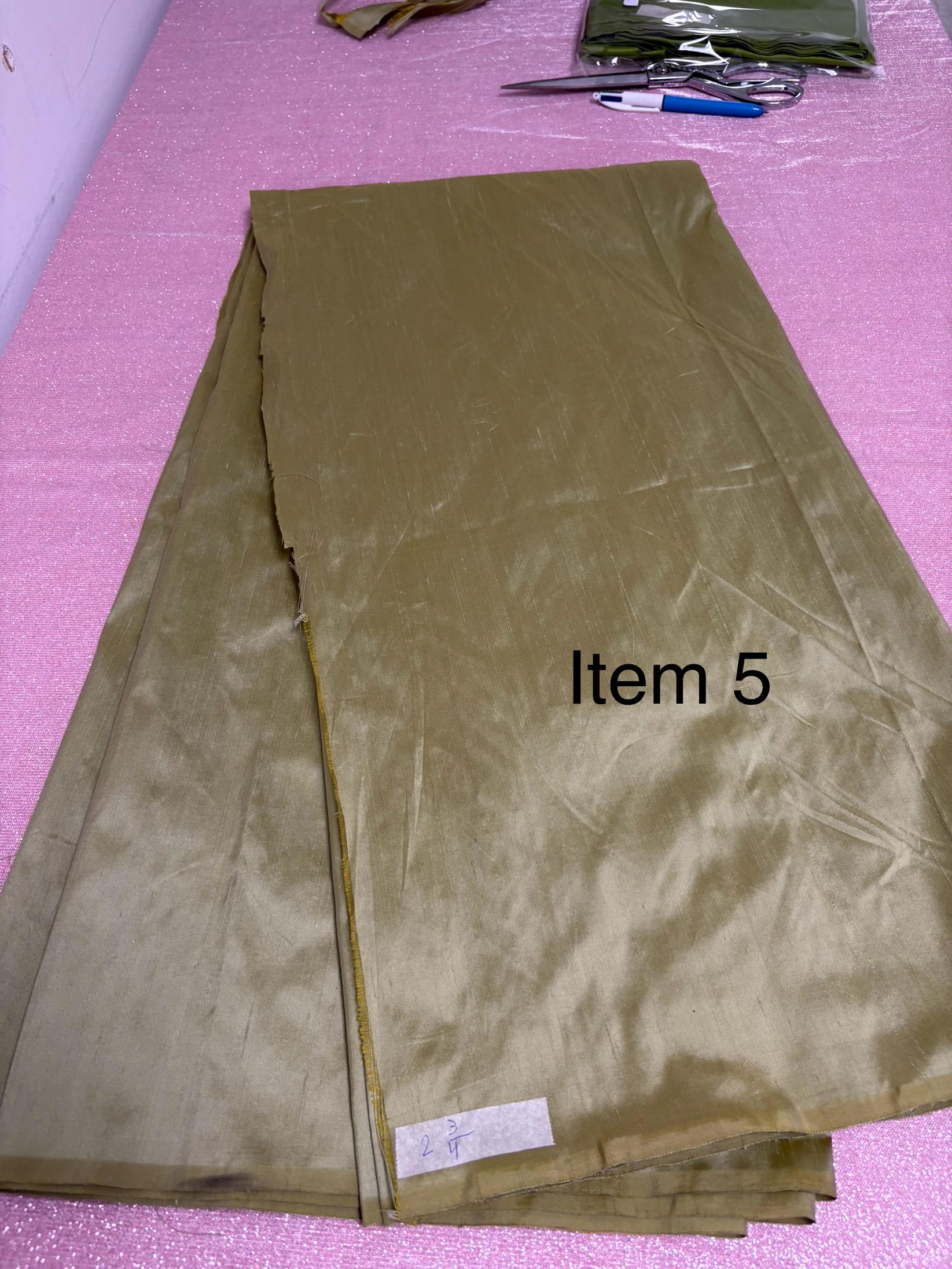 100% silk Dupioni Taffeta width 54" color is Lt. Sage. Machine made, fabric has slubs. Item # 5. free sample.