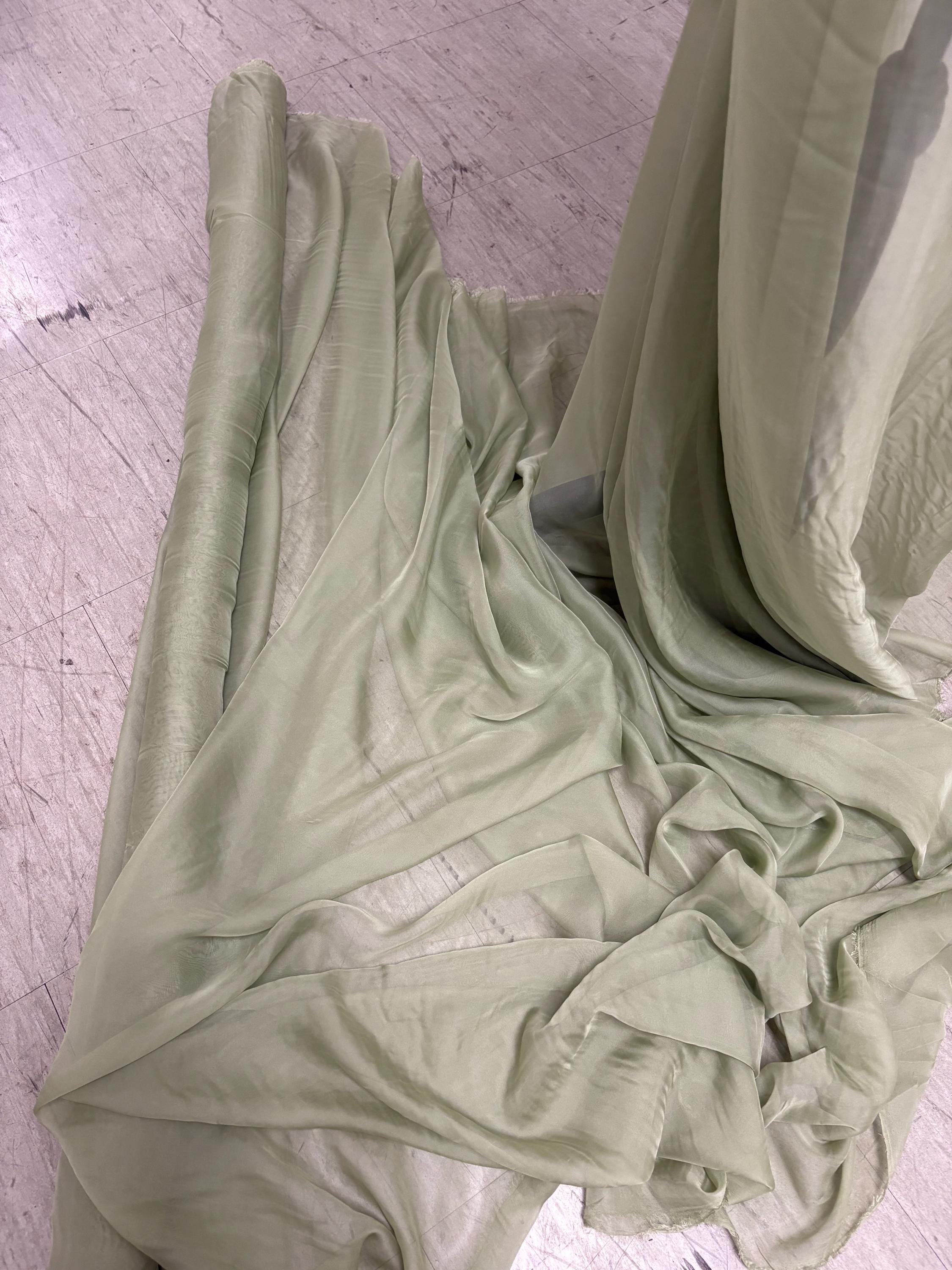 A 3 yards chiffon fabric color Lt.sage sell by 3 yards increment continuous, width 58/60" polyester, soft sheer see through fabric.