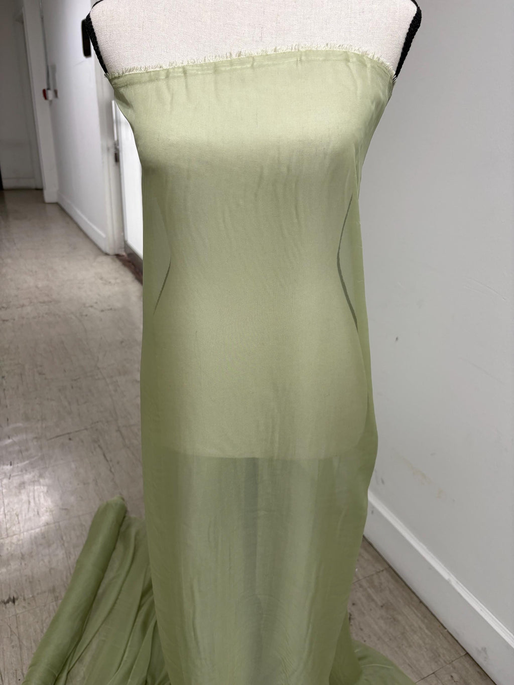 A 3 yards chiffon fabric color Lt.sage sell by 3 yards increment continuous, width 58/60" polyester, soft sheer see through fabric.