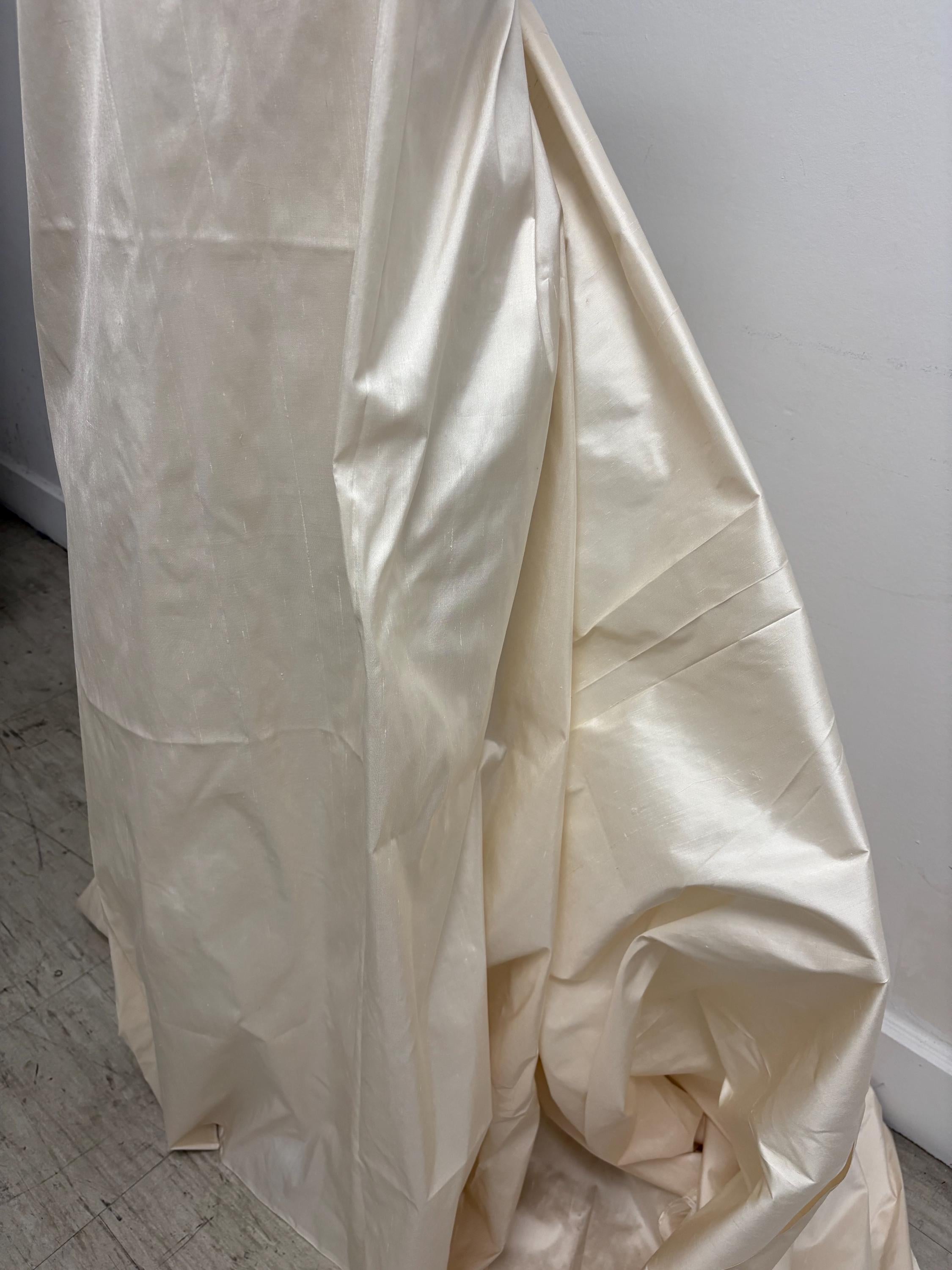 100% silk Dupioni Taffeta L. champagne 3.5 yards width 54". Machine made, fabric has slubs. free sample. item # 1197