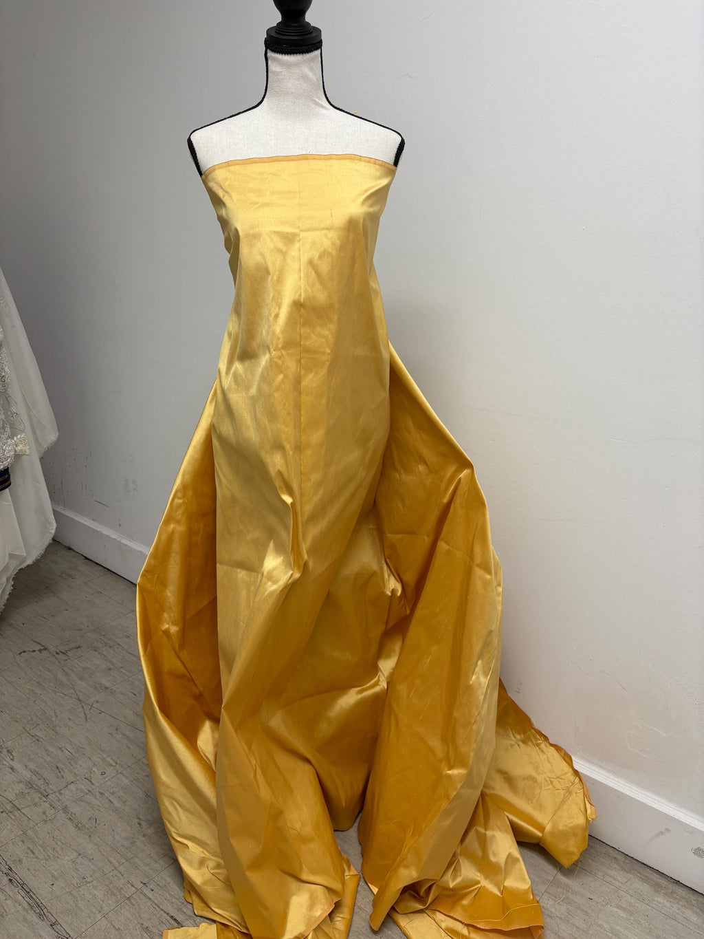 100% silk Dupioni Taffeta width 54" color is Gold 2209. Machine made, fabric has slubs. free sample. shop with confidence.