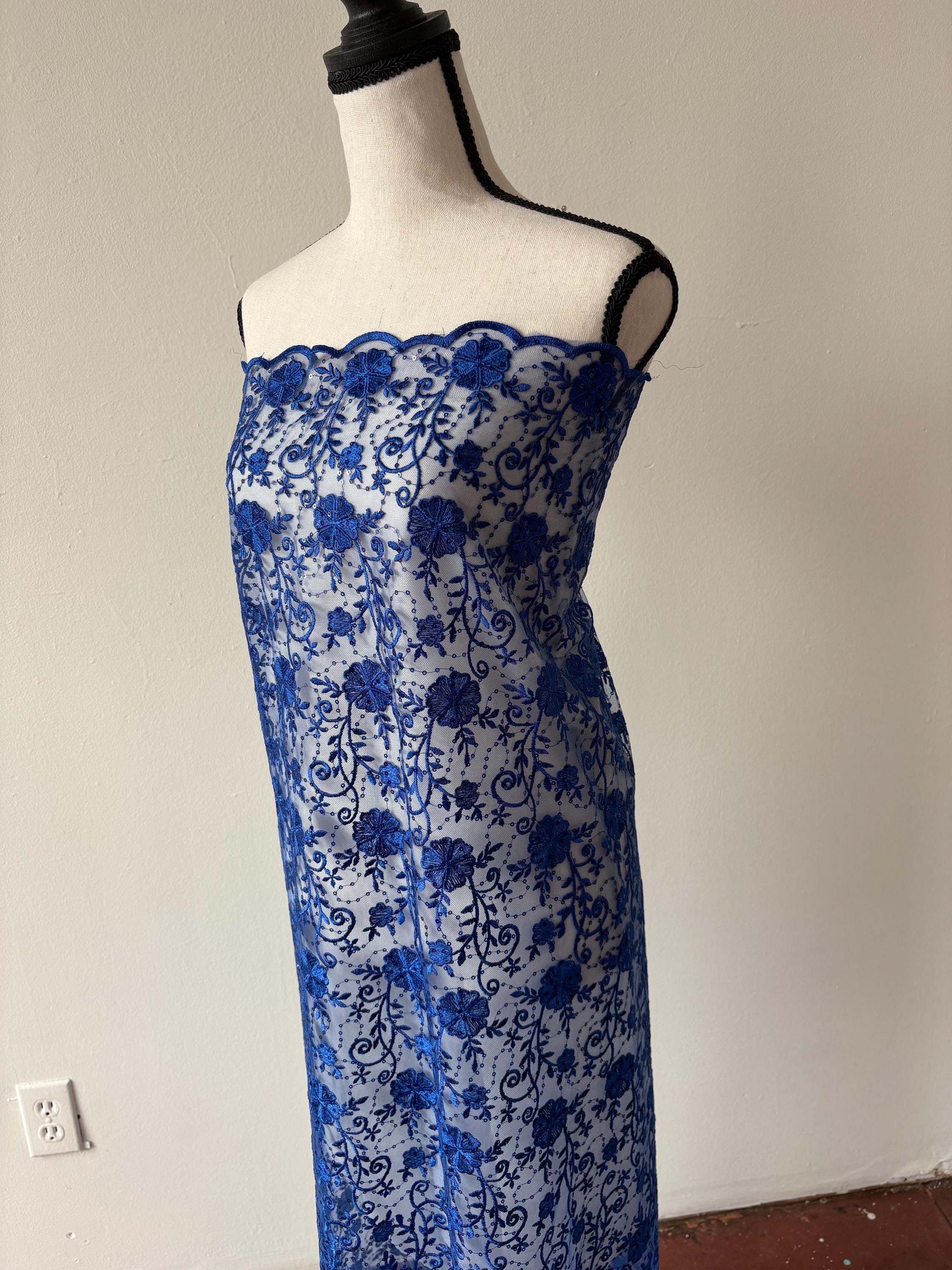 Royal lace fabric double scalloped embroidery sequence width 49". Design 04331279. shop with confidence ask fro free sample.