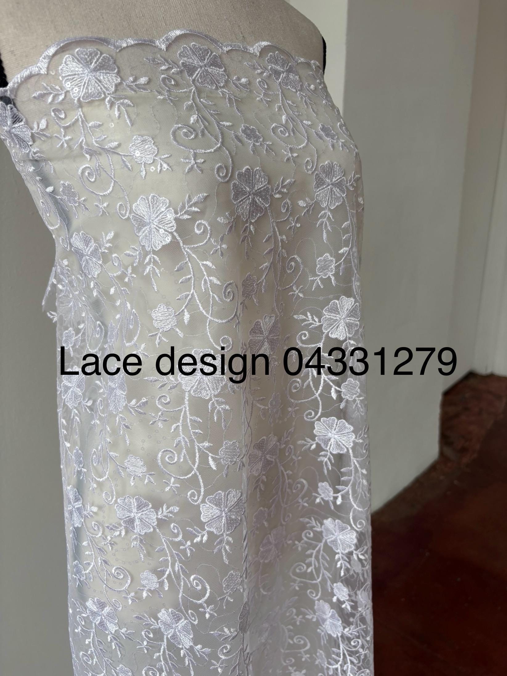 White lace fabric double scalloped embroidery sequence width 49". Design 04331279. shop with confidence ask fro free sample.