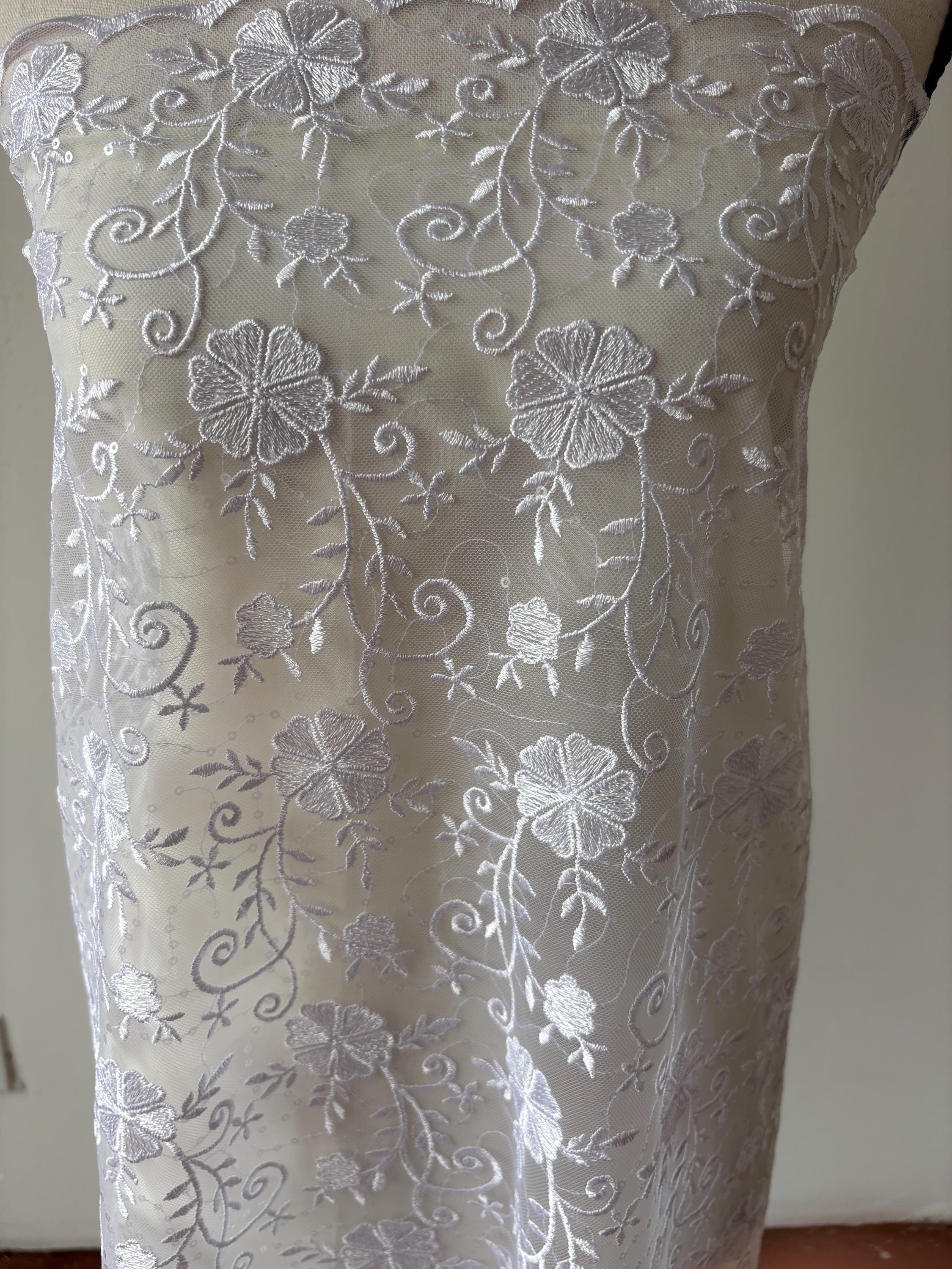 White lace fabric double scalloped embroidery sequence width 49". Design 04331279. shop with confidence ask fro free sample.