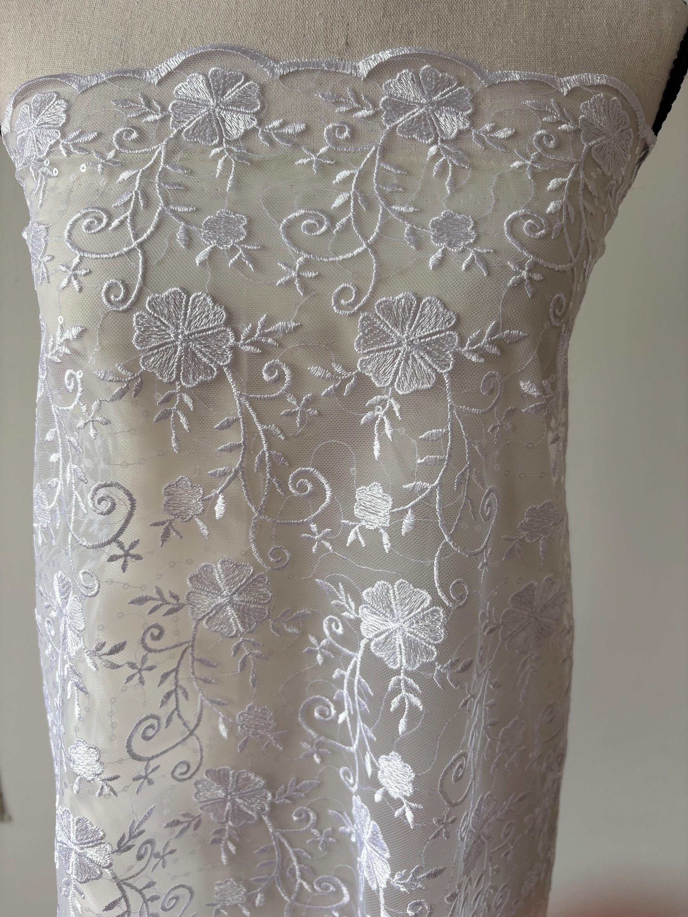 White lace fabric double scalloped embroidery sequence width 49". Design 04331279. shop with confidence ask fro free sample.