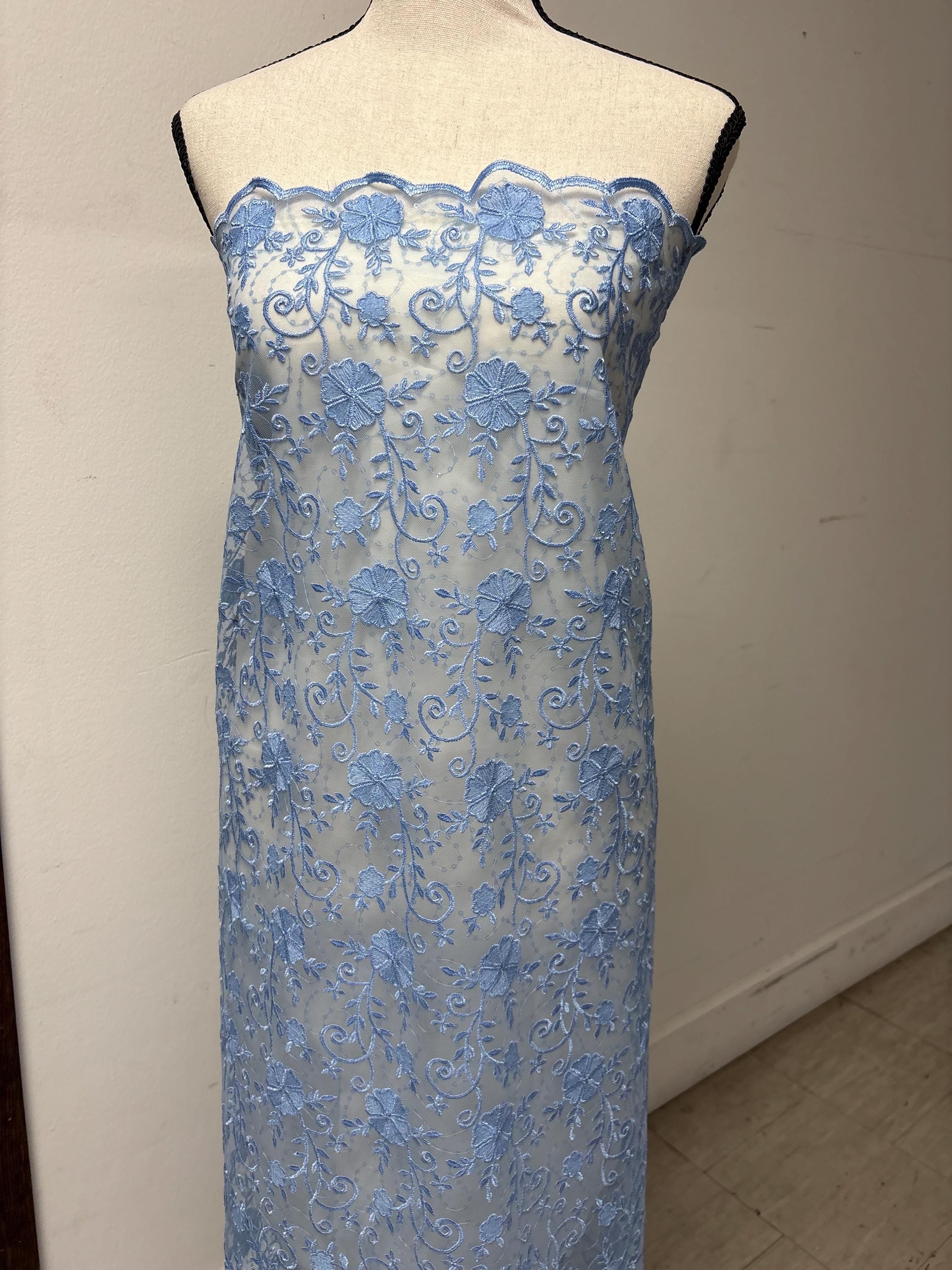 Blue lace fabric double scalloped embroidery sequence width 49". Design 04331279. shop with confidence ask fro free sample.