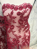 Burgundy Lace fabric design bloom 6 width 49". Double scalloped embroidery sequence.