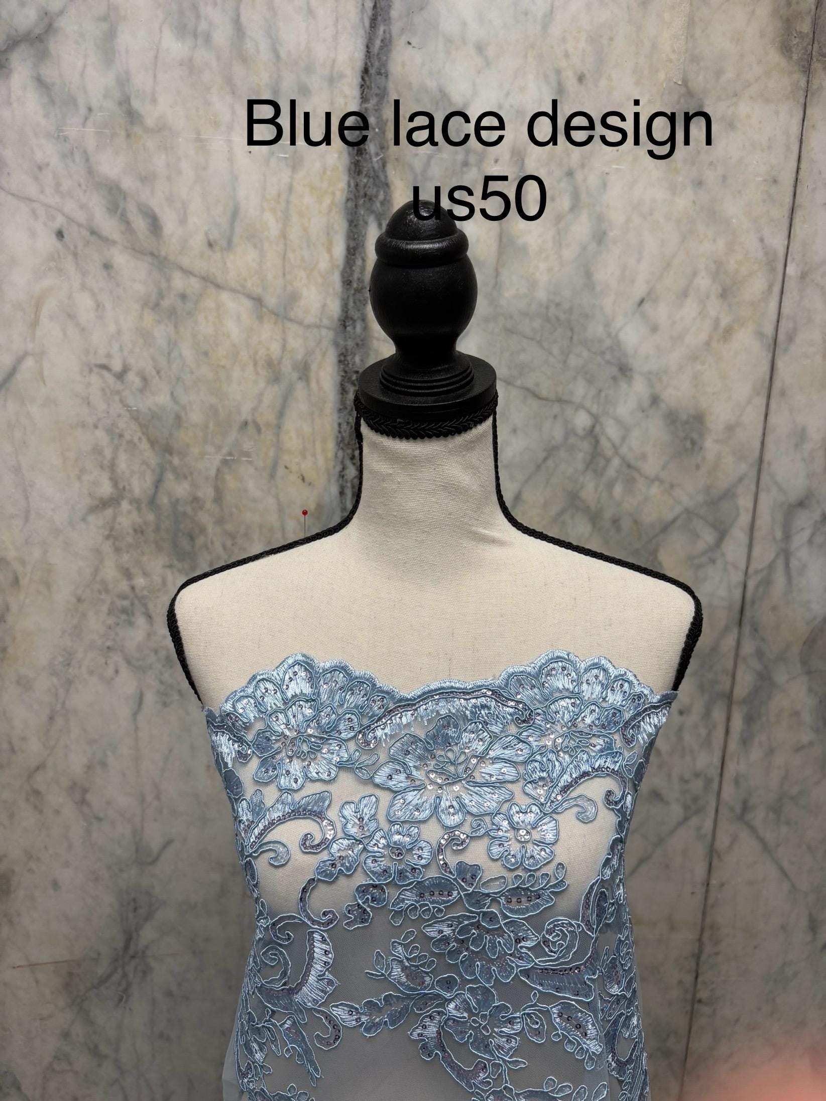 Blue Lace Fabric Design US50. Double scalloped sequence embroidered width 49/50 inches. condition New. sell by yard.