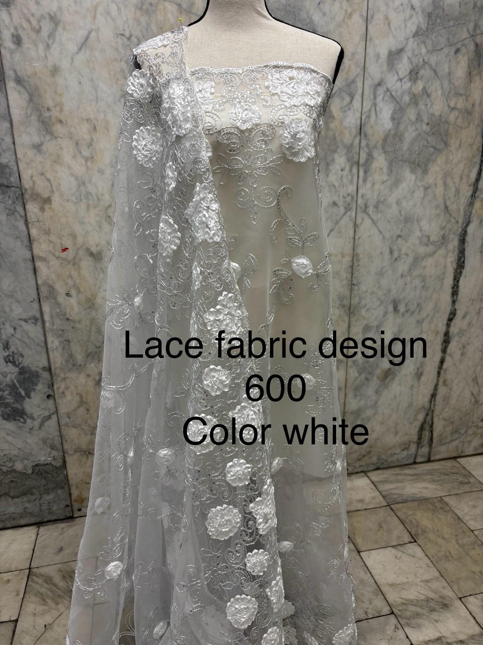 A 3 yards cut lace design 600 color white 49/50" double scalopped sequins embroidery. tela de encaje de color blanco