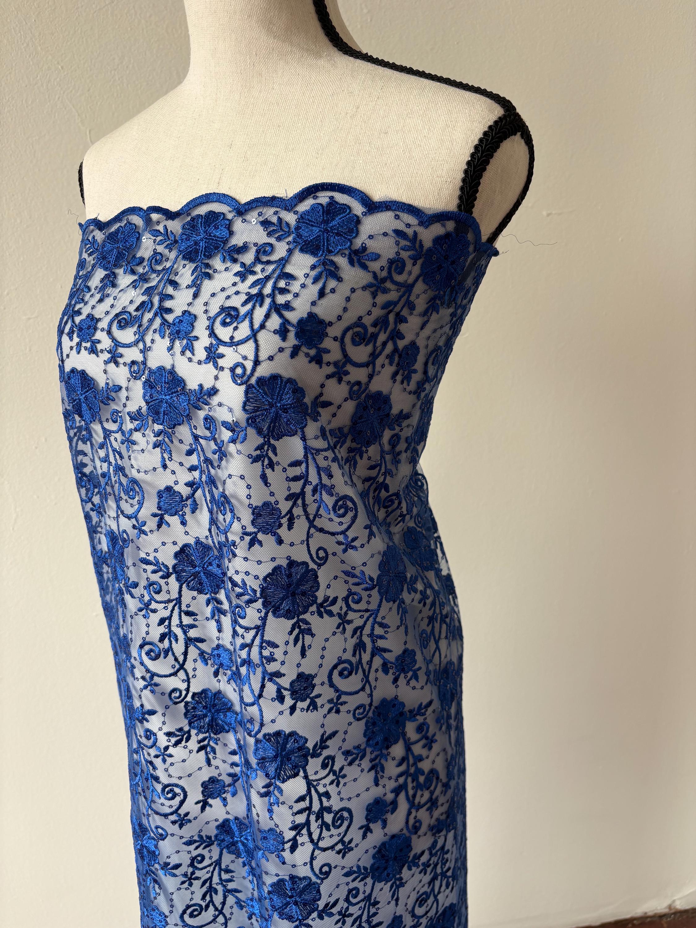 Royal lace fabric double scalloped embroidery sequence width 49". Design 04331279. shop with confidence ask fro free sample.