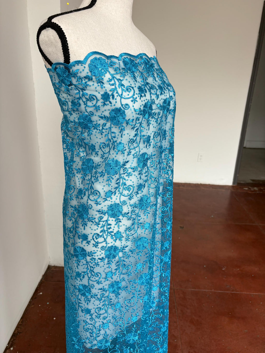 Turquoise lace fabric double scalloped embroidery sequence width 49". Design 04331279. shop with confidence ask fro free sample.
