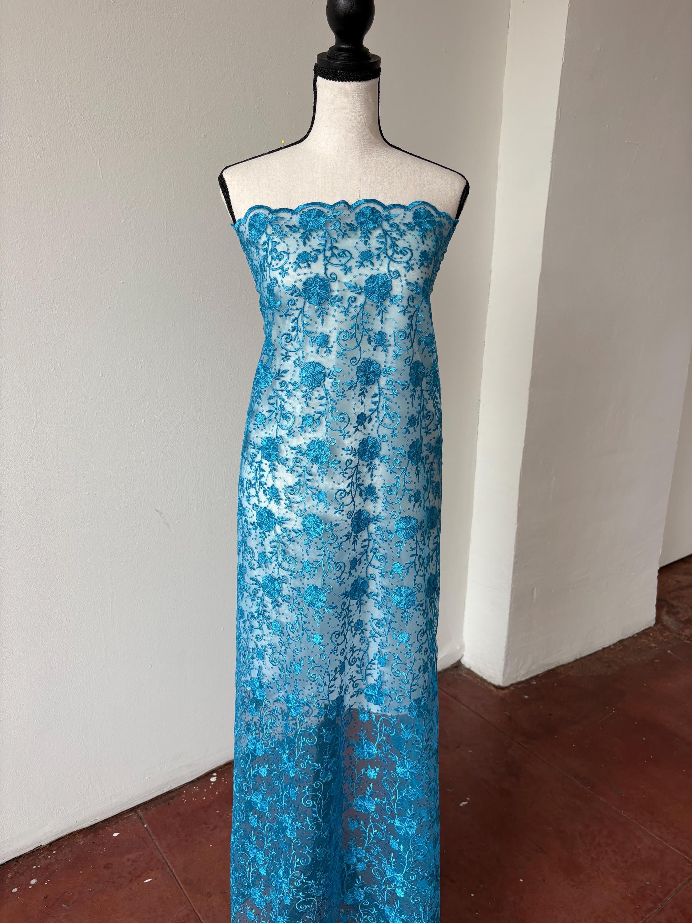 Turquoise lace fabric double scalloped embroidery sequence width 49". Design 04331279. shop with confidence ask fro free sample.