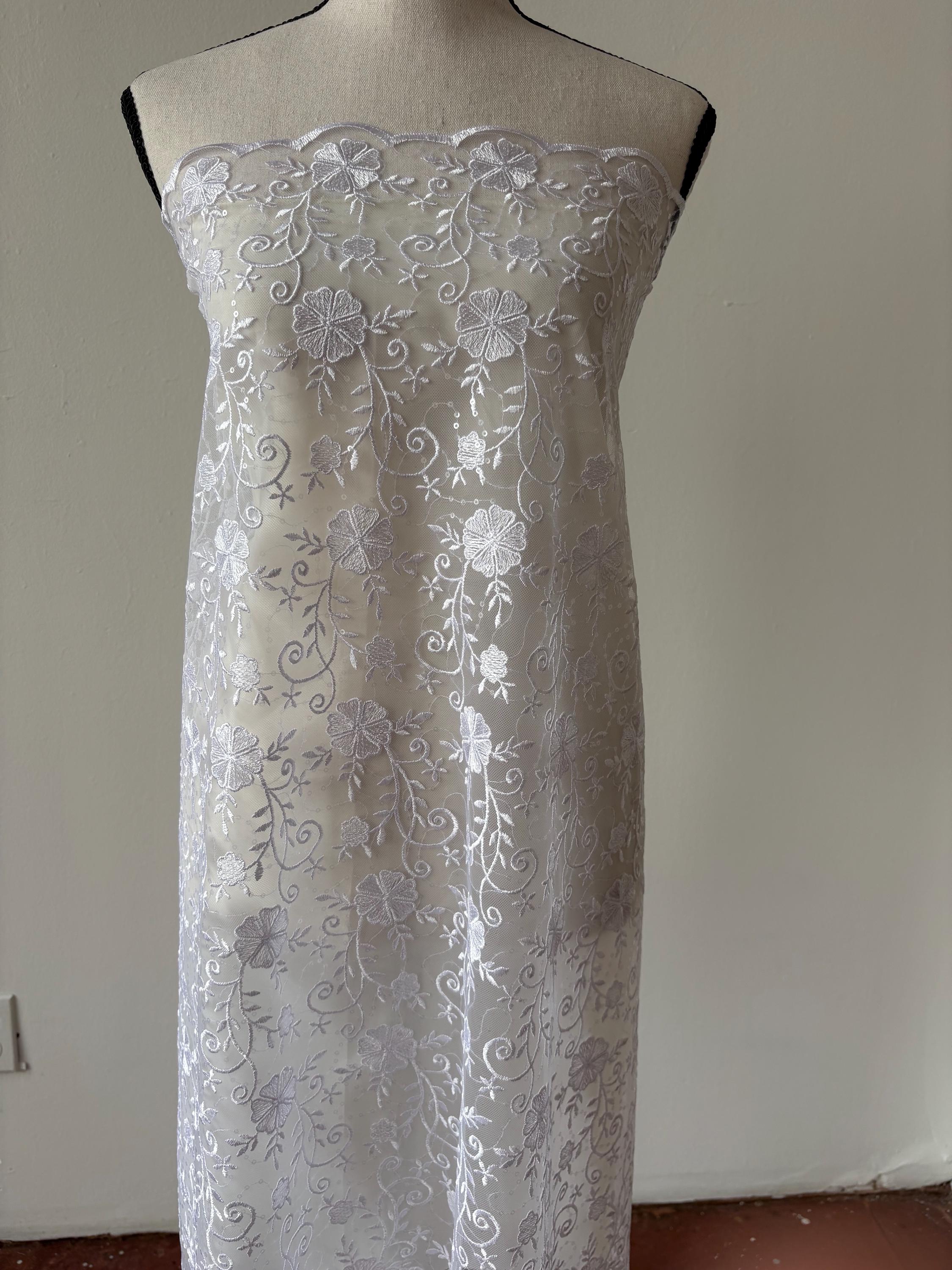 White lace fabric double scalloped embroidery sequence width 49". Design 04331279. shop with confidence ask fro free sample.