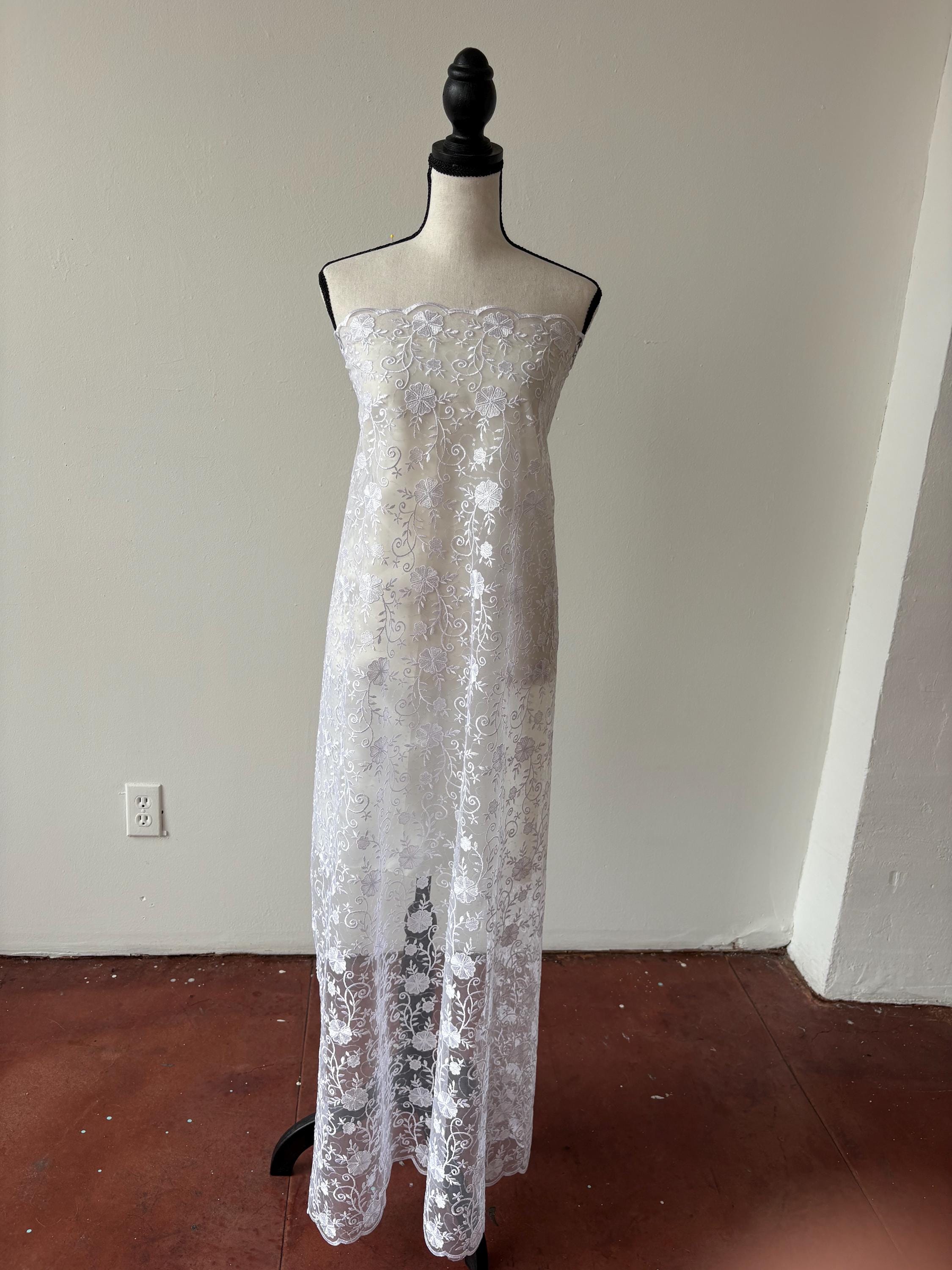 White lace fabric double scalloped embroidery sequence width 49". Design 04331279. shop with confidence ask fro free sample.