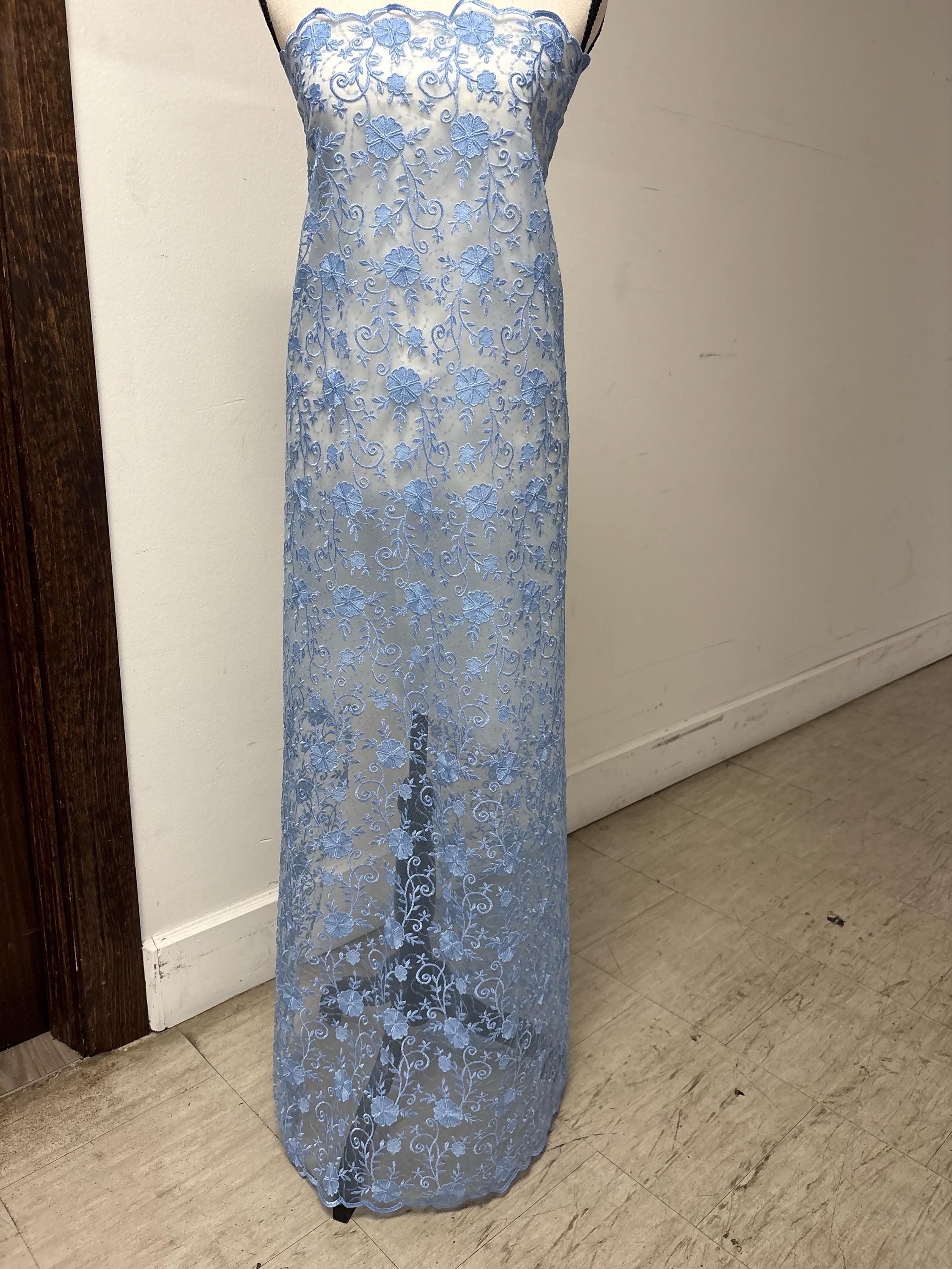 Blue lace fabric double scalloped embroidery sequence width 49". Design 04331279. shop with confidence ask fro free sample.