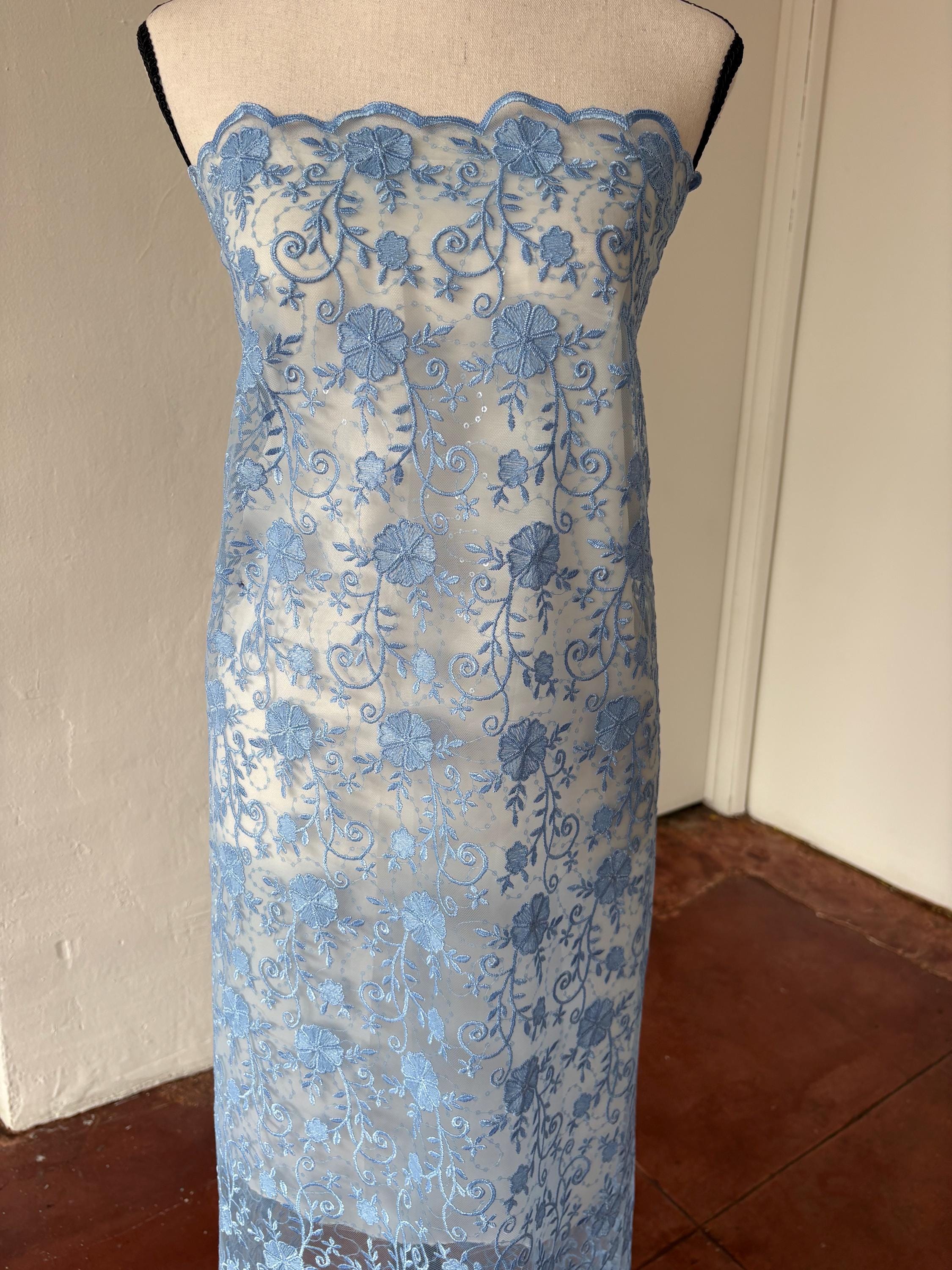 Blue lace fabric double scalloped embroidery sequence width 49". Design 04331279. shop with confidence ask fro free sample.