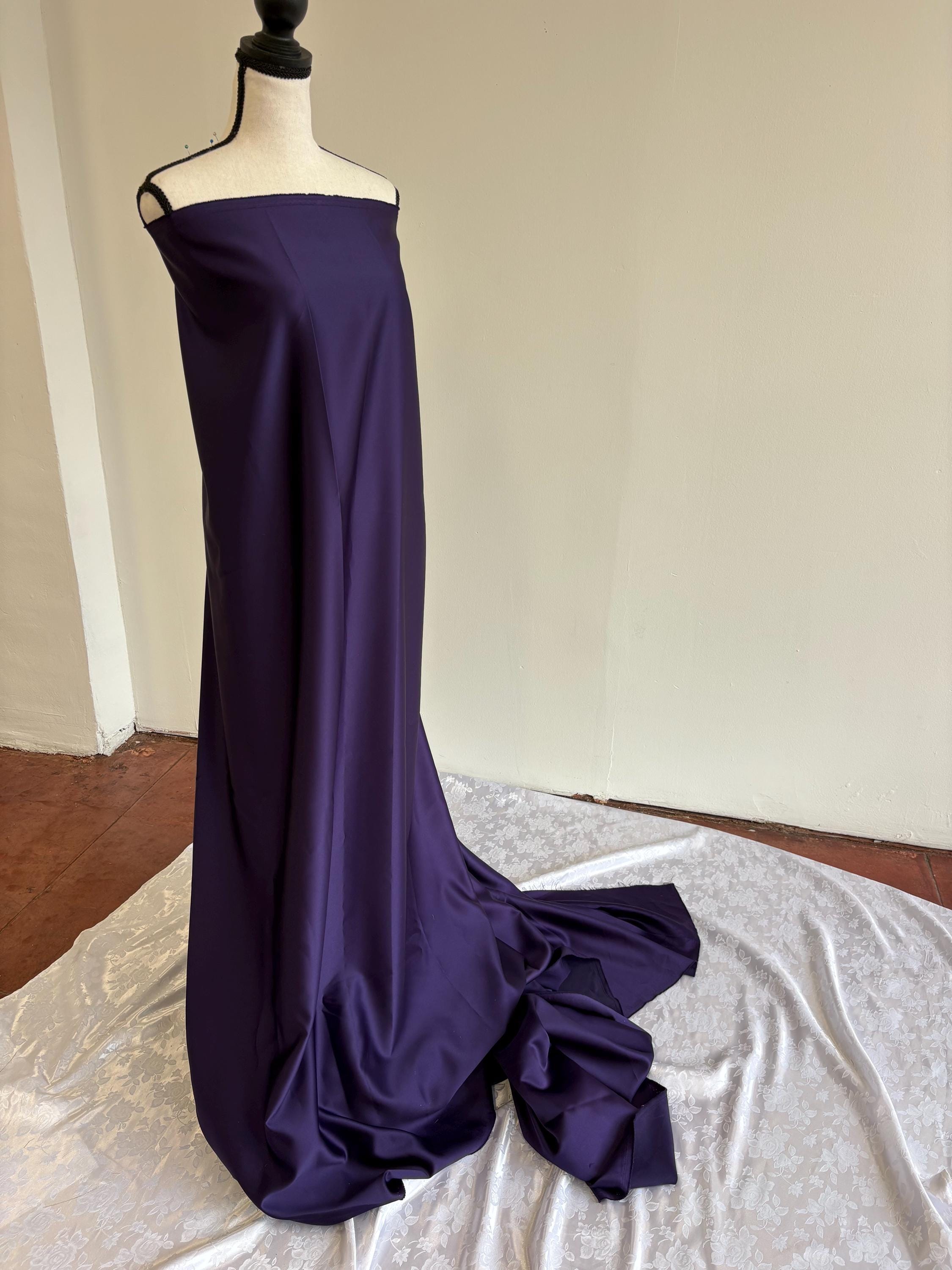 Purple dull satin fabric, 58/60” wide, made of polyester – an excellent choice for gowns.