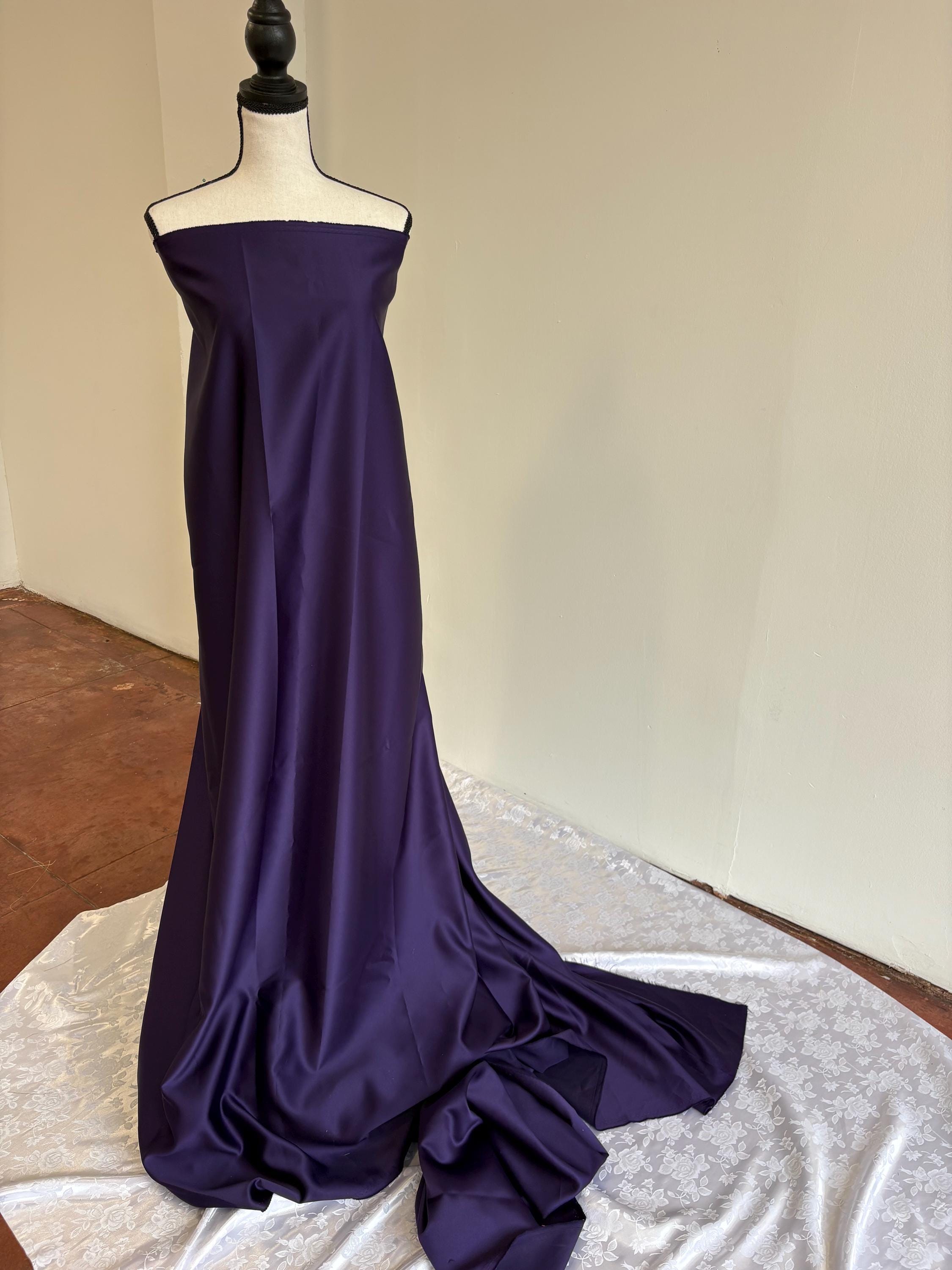 Purple dull satin fabric, 58/60” wide, made of polyester – an excellent choice for gowns.