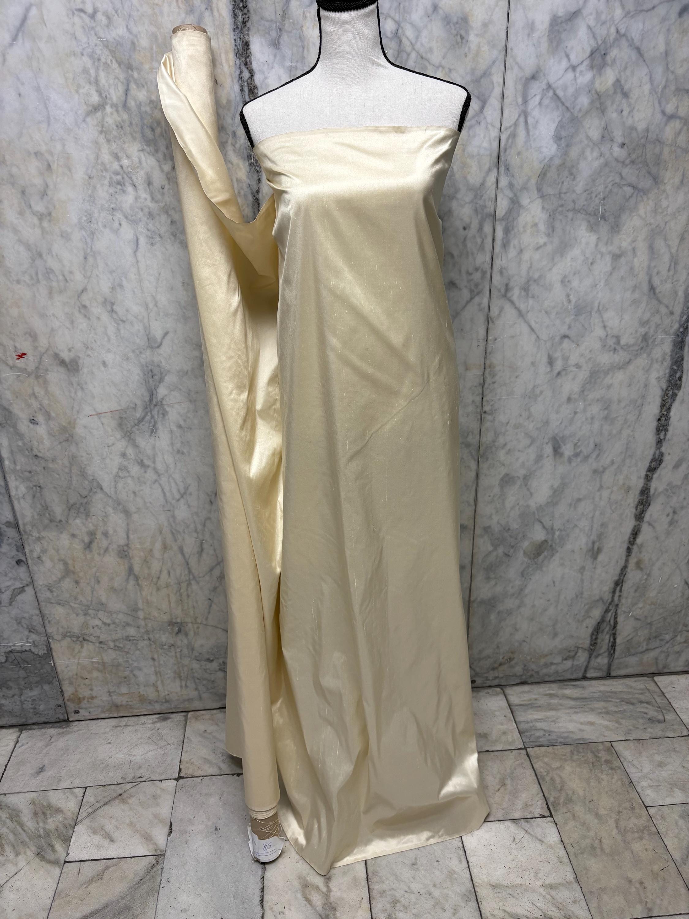 100% silk Dupioni Taffeta 3 1/2 yards cut width 54" color Champagne#2274-B . Machine made fabric has slubs. Free sample.item# 1195