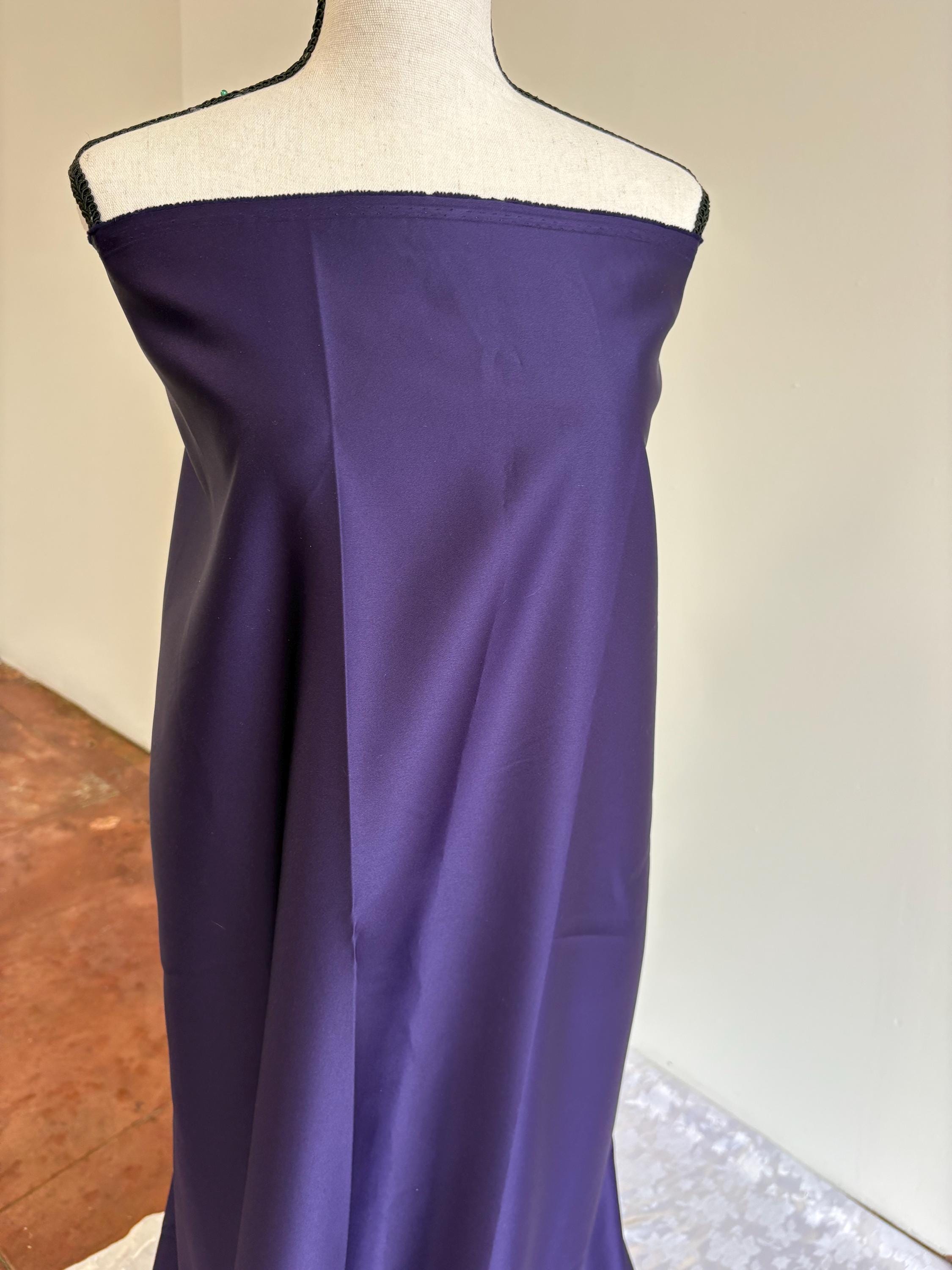 Purple dull satin fabric, 58/60” wide, made of polyester – an excellent choice for gowns.