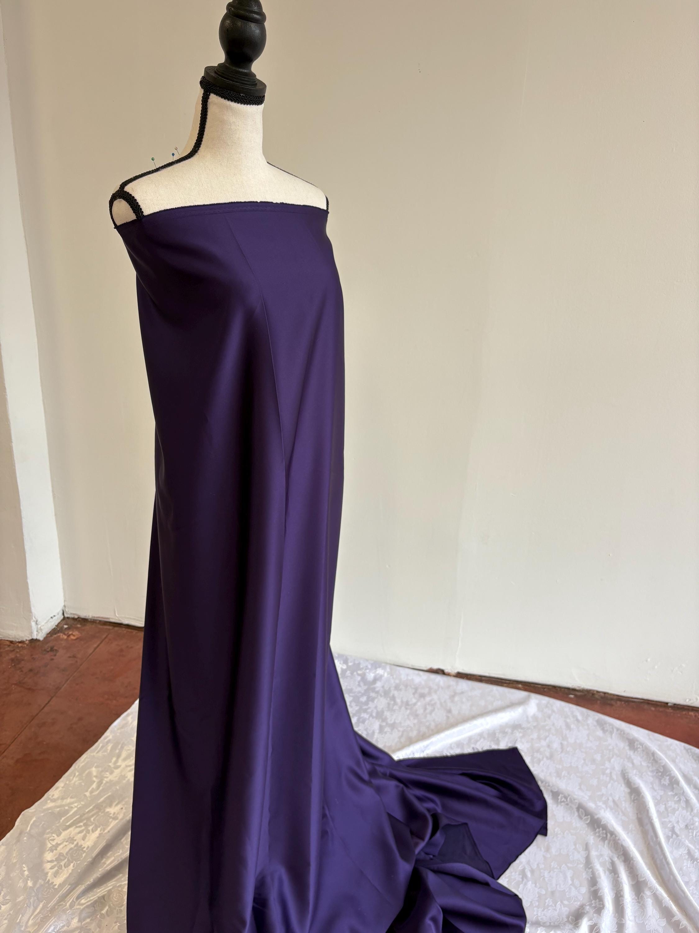 Purple dull satin fabric, 58/60” wide, made of polyester – an excellent choice for gowns.