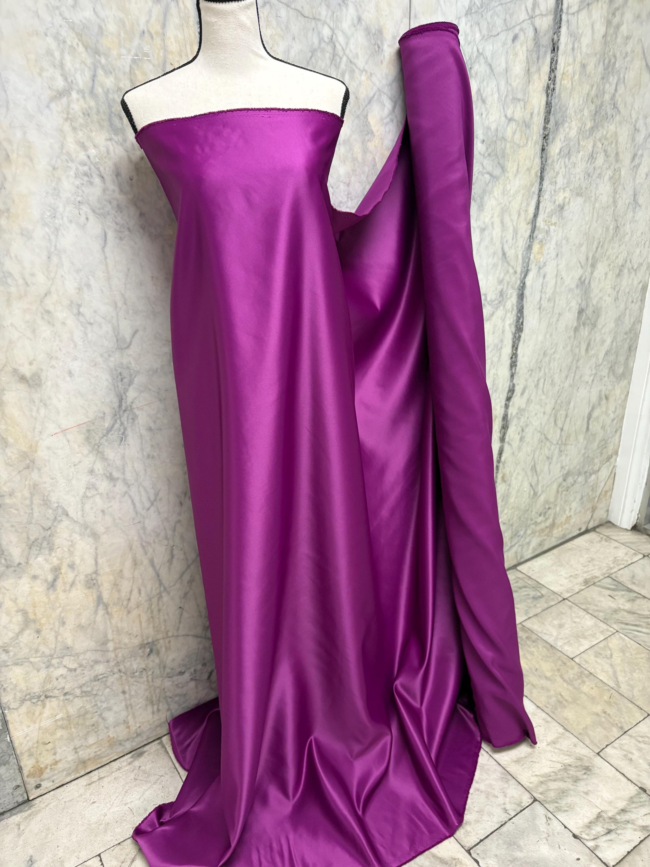 Bridal Satin Color Magenta 1473 dull finished, Polyester width 58/60" . Great for gown and suits, party formal dress.