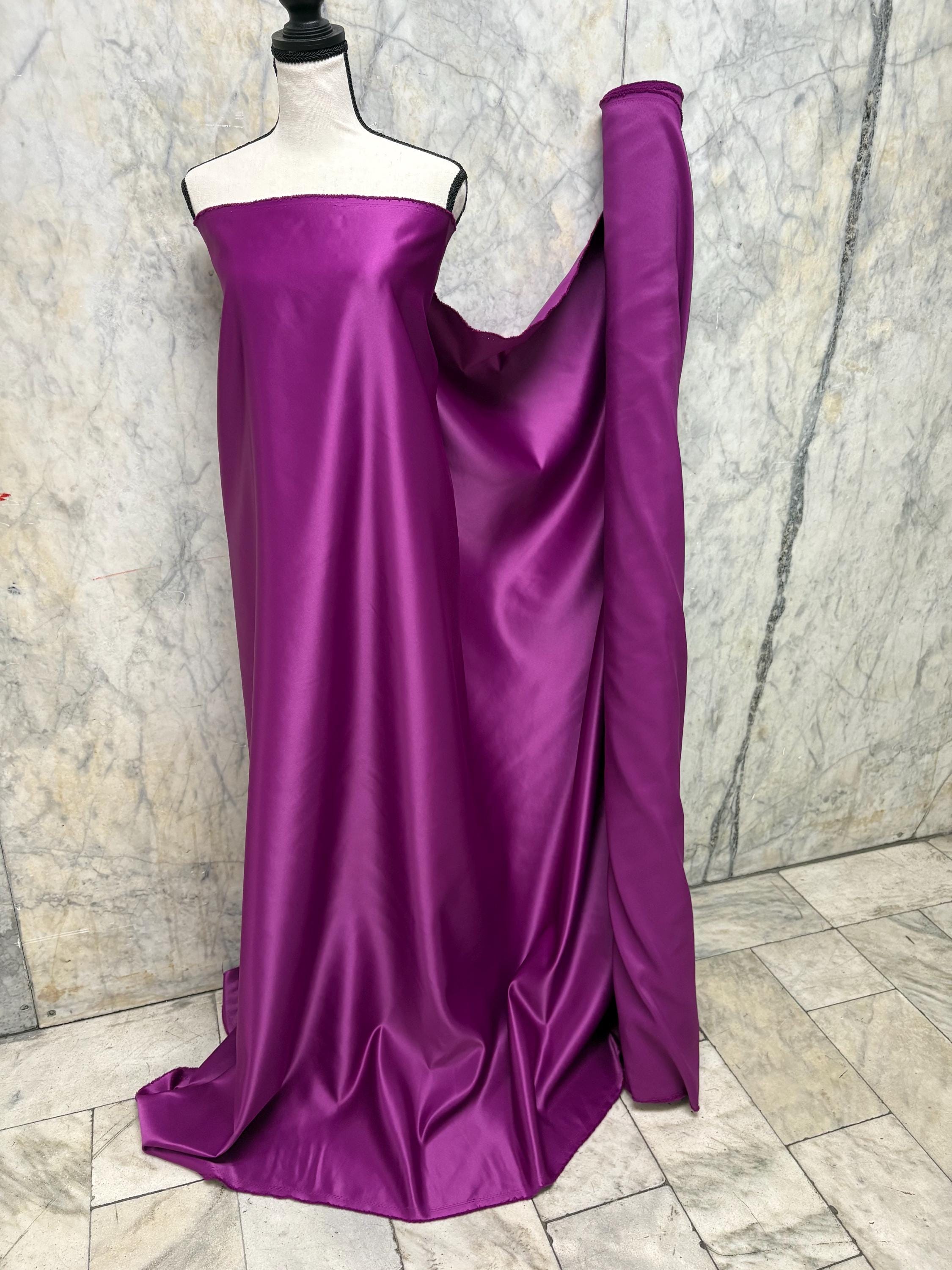 Bridal Satin Color Magenta 1473 dull finished, Polyester width 58/60" . Great for gown and suits, party formal dress.