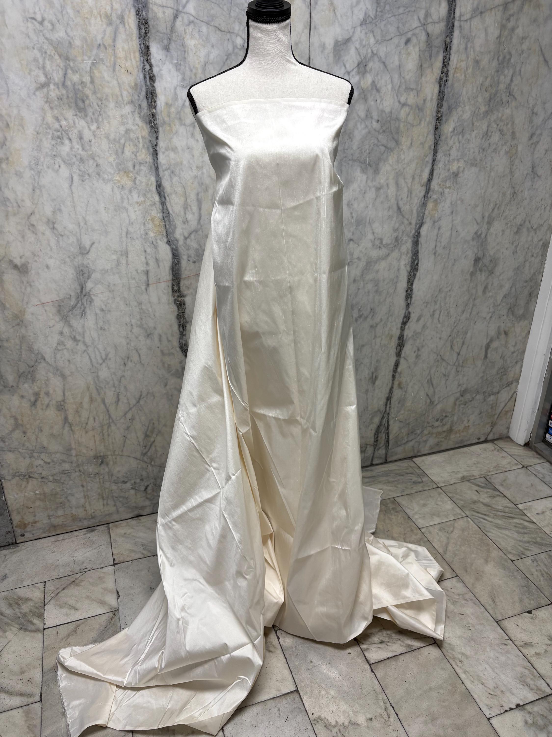 100% silk Dupioni Taffeta width 54" 2.50 yards cut color Ivory. Machine made, fabric has slubs. Free sample. shop with confidence. item 1198